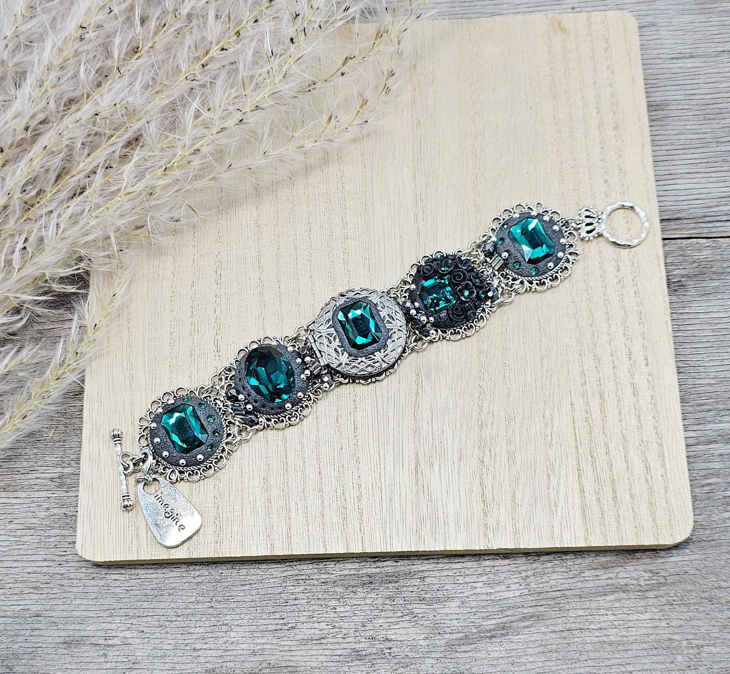 Emerald crystal bracelet with locket, black polymer clay flowers