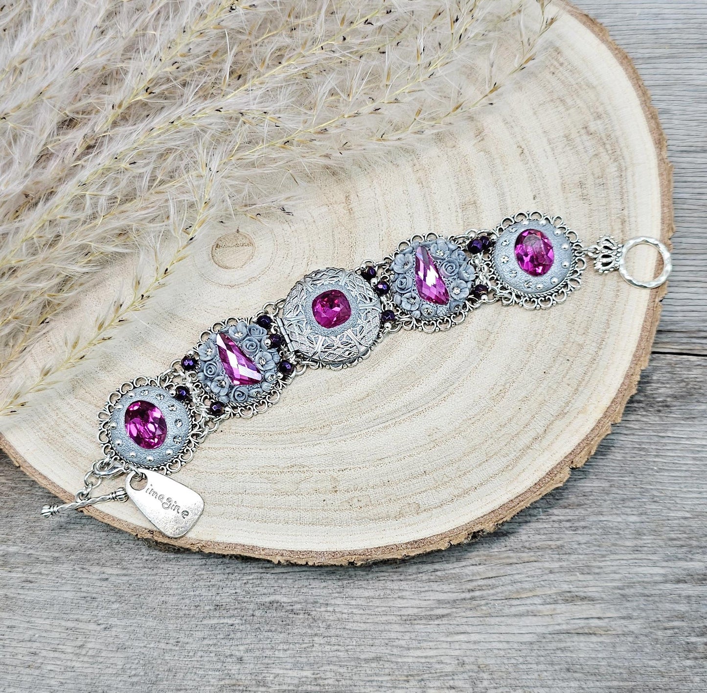 Pink crystal bracelet with locket ant silver tone polymer clay flowers