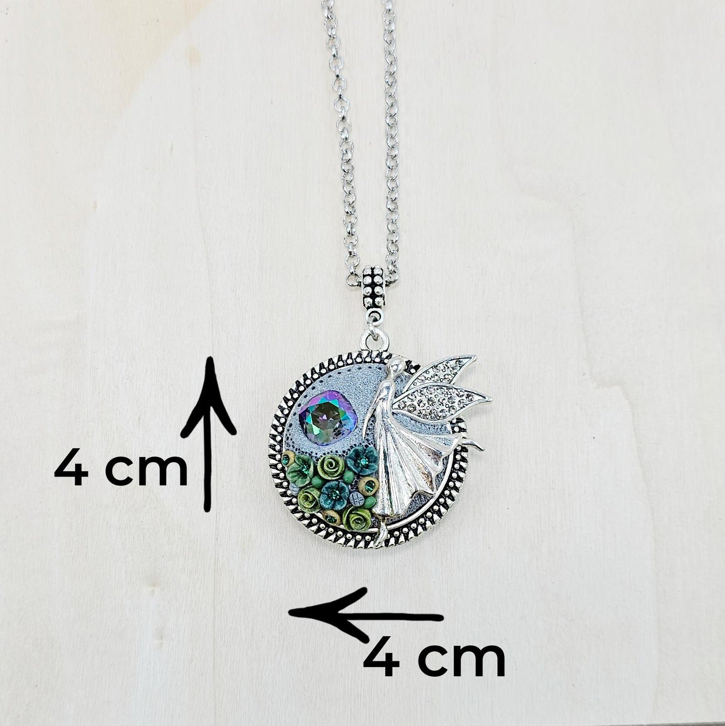 double sided pendant locket for photo or essentiale oil, with fairy angel, crysla, polymer clay green flowers
