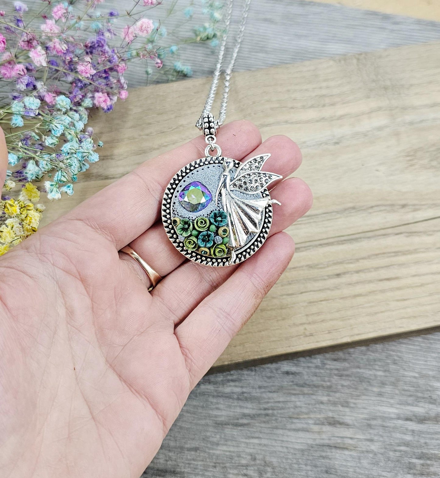 double sided pendant locket for photo or essentiale oil, with fairy angel, crysla, polymer clay green flowers
