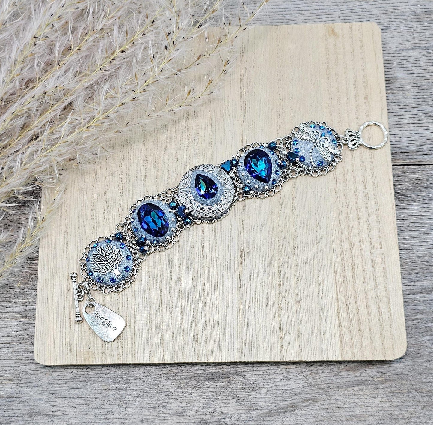 Blue crystal bracelet with polymer clayflowers, locket, dragonfly and tree. polymer clay, polymer bracelet, Clay Bracelet, polymer clay jewelry, Polymer clay beads, Polymer Flowers, Crystal Bracelet