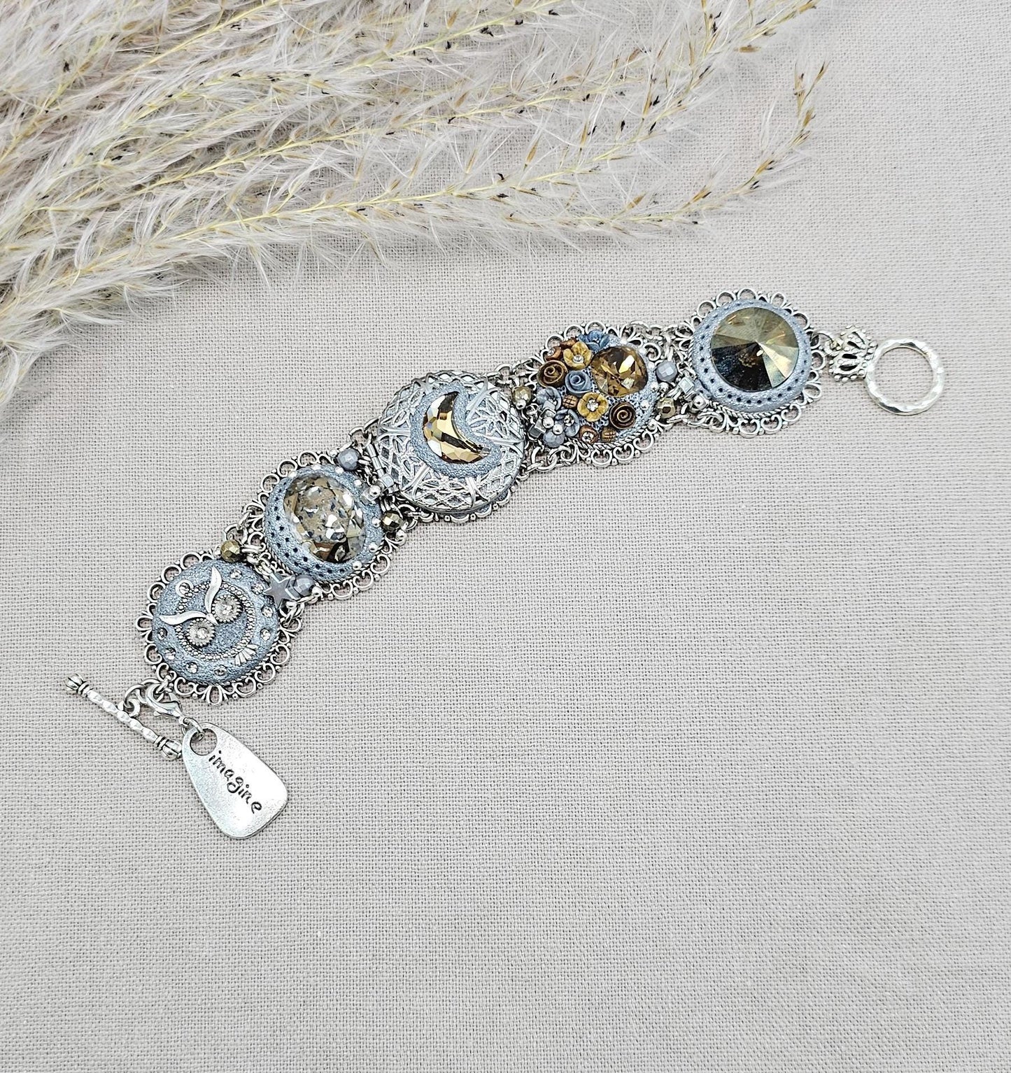 Brown crystal bracelet with locket, owl,moon, polymer clay flowers