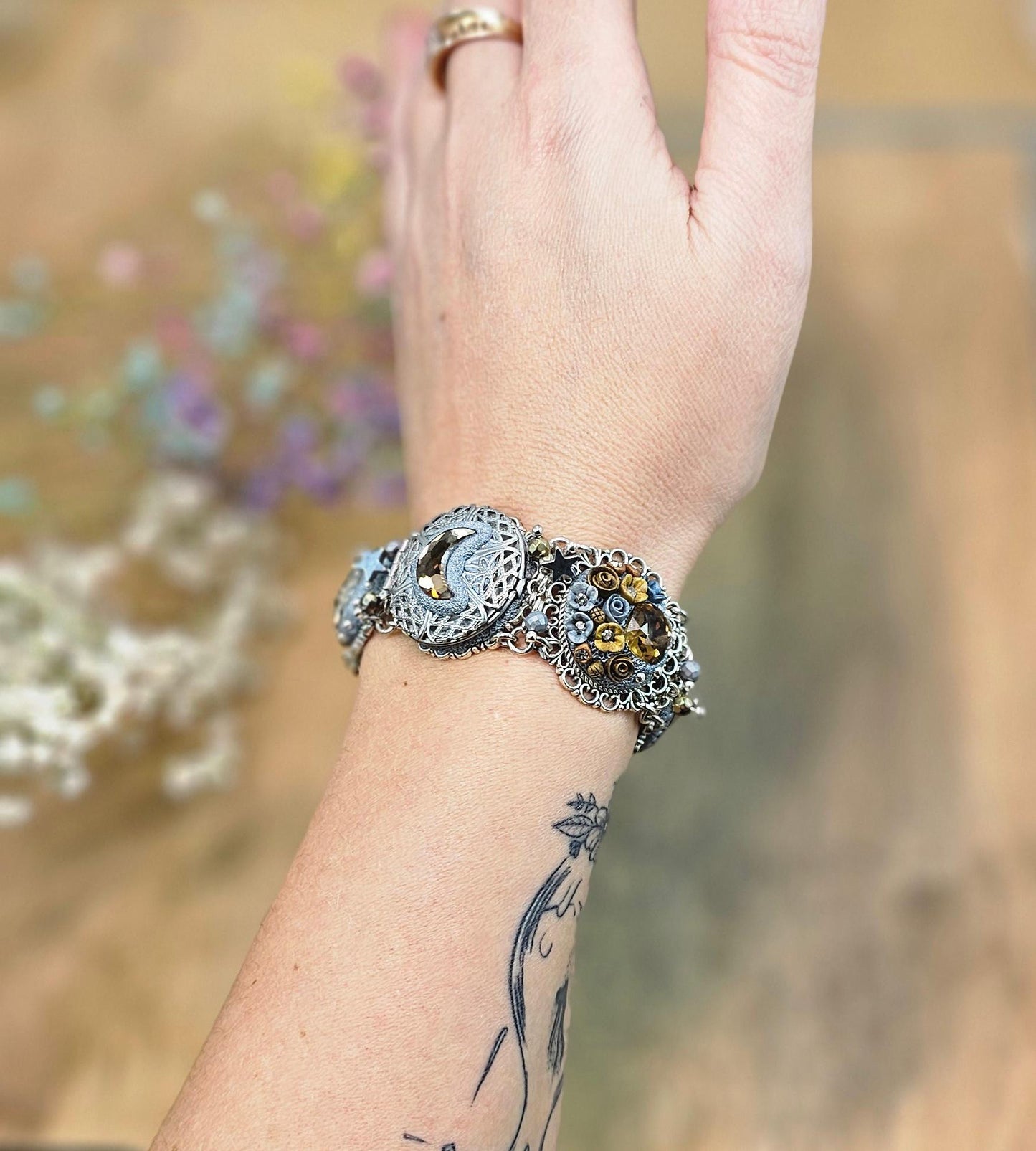 Brown crystal bracelet with locket, owl,moon, polymer clay flowers