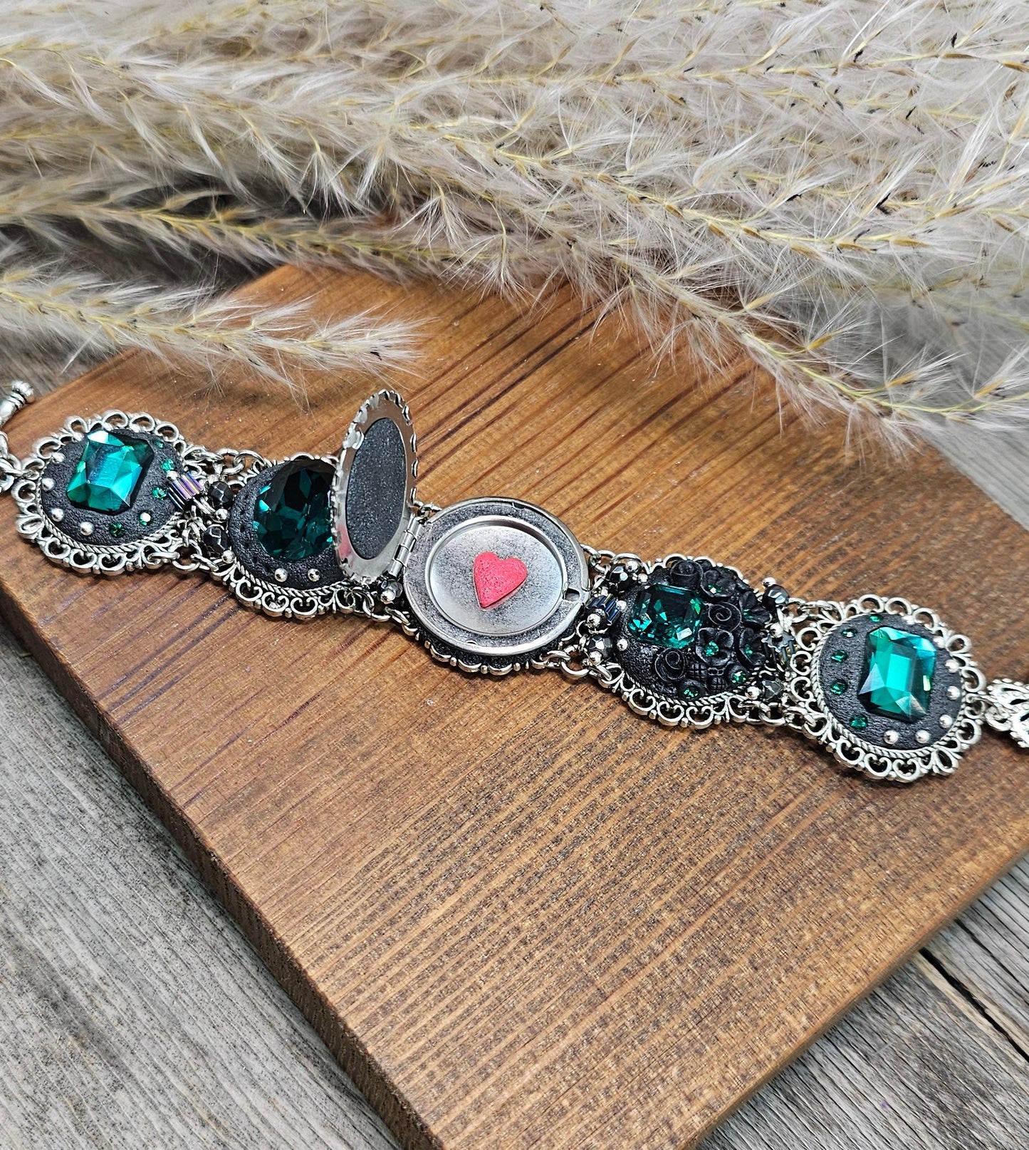 Emerald crystal bracelet with locket, black polymer clay flowers