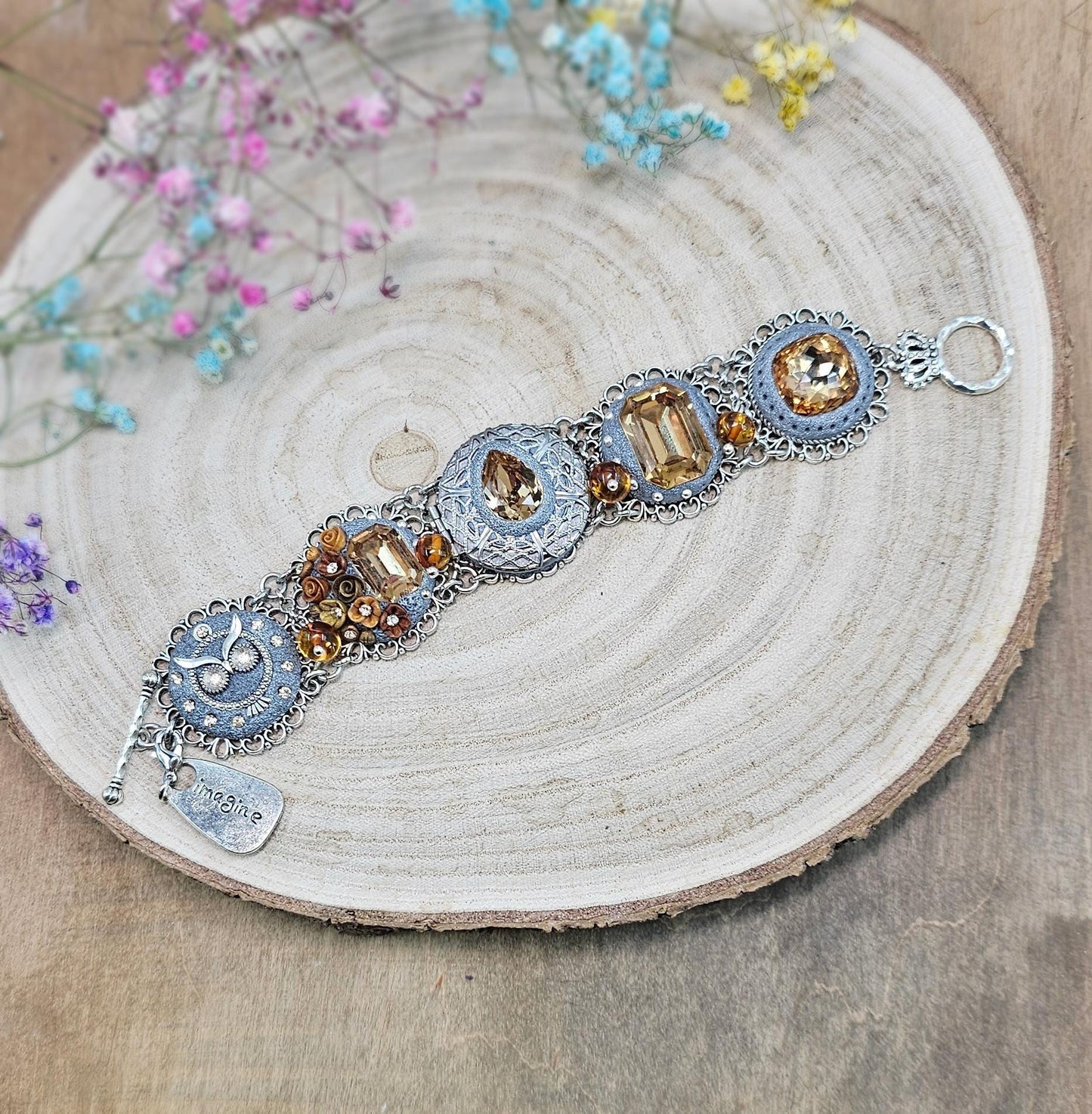 Gold color crystal bracelet with locket, owl detail, polymer clay flowers, floral bracelet. With amber beads. Amber Beads, Gold Beads, Tone Bracelet, Owl Bracelet, Polymer Flowers, Crystal Bracelet, Gold Crystal