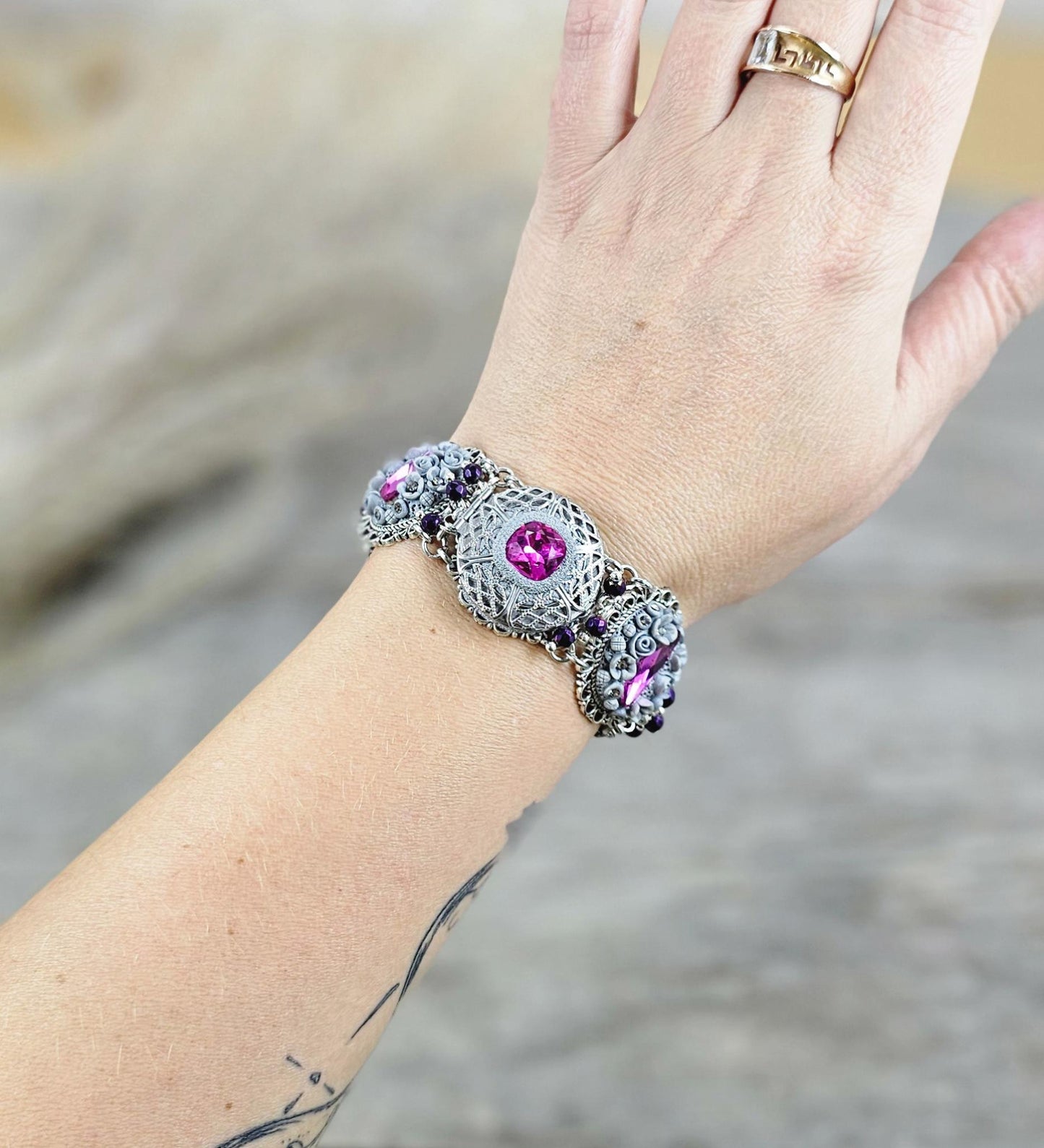 Pink crystal bracelet with locket ant silver tone polymer clay flowers