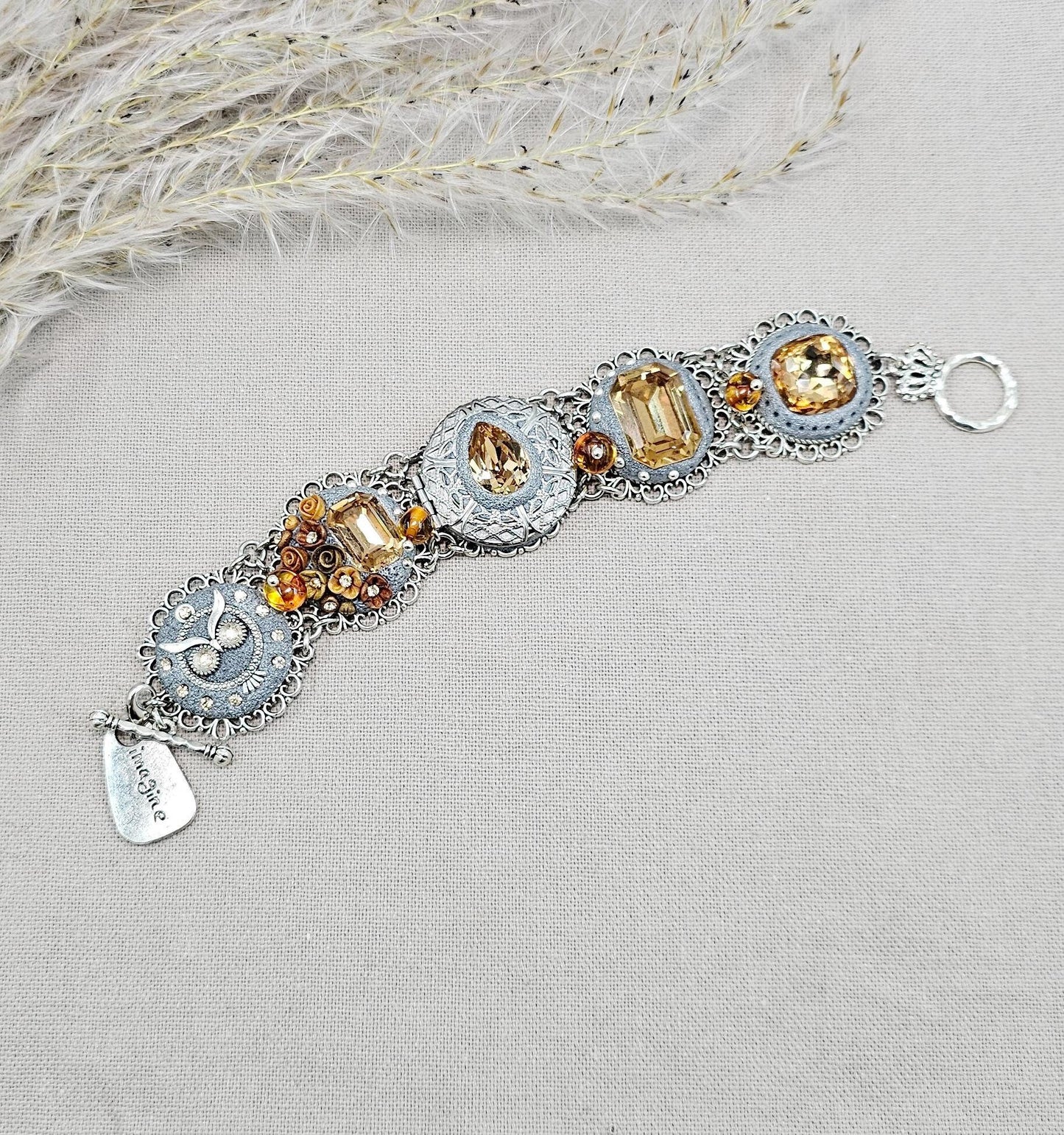 Gold color crystal bracelet with locket, owl detail, polymer clay flowers, floral bracelet. With amber beads. Amber Beads, Gold Beads, Tone Bracelet, Owl Bracelet, Polymer Flowers, Crystal Bracelet, Gold Crystal