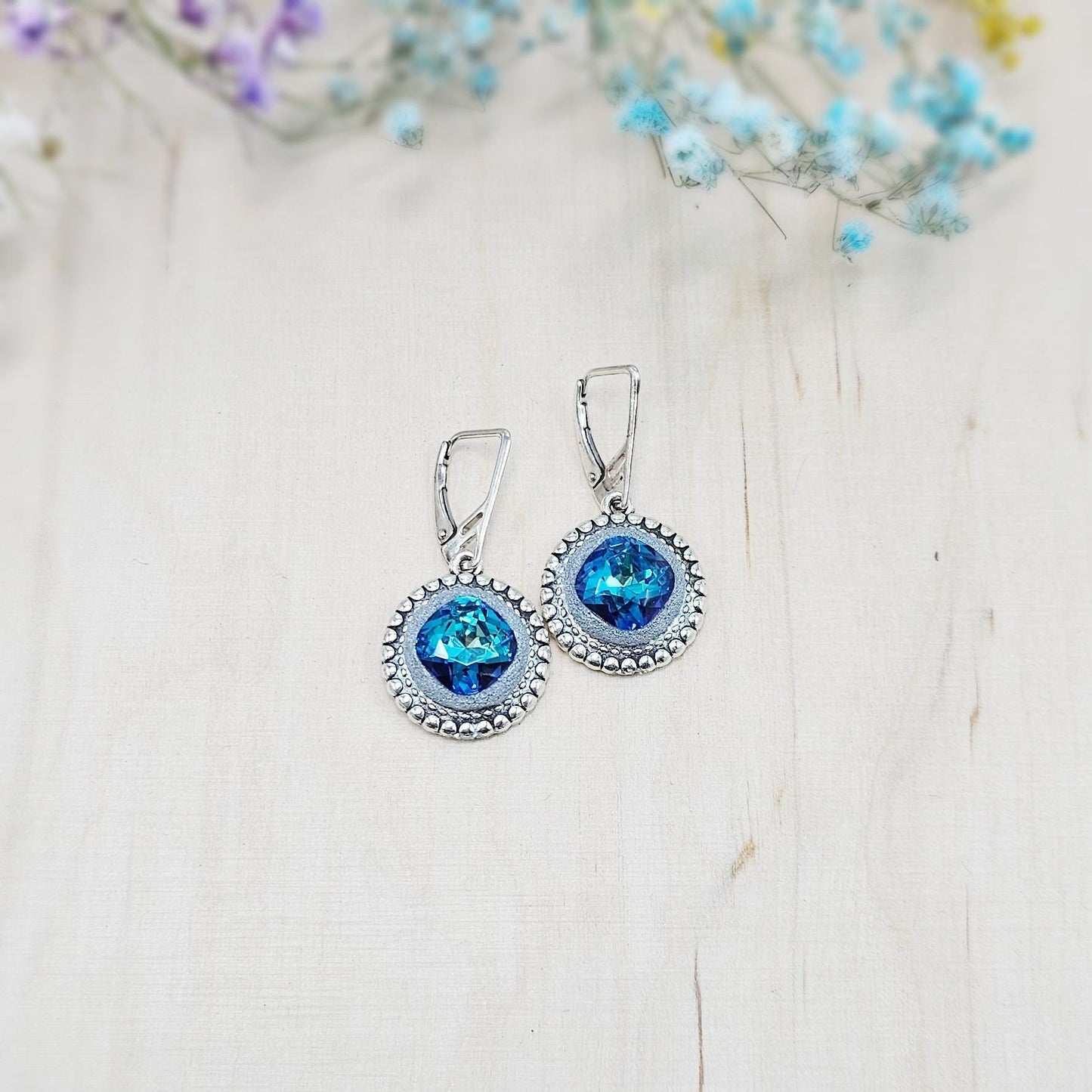 Elegant BLUE dangle earrings with sparkling blue crystals set in metal frames with polymer clay details. Silver hooks. Packaged in a paper gift box. A perfect accessory for any occasion, adding a touch of brilliance and sophistication