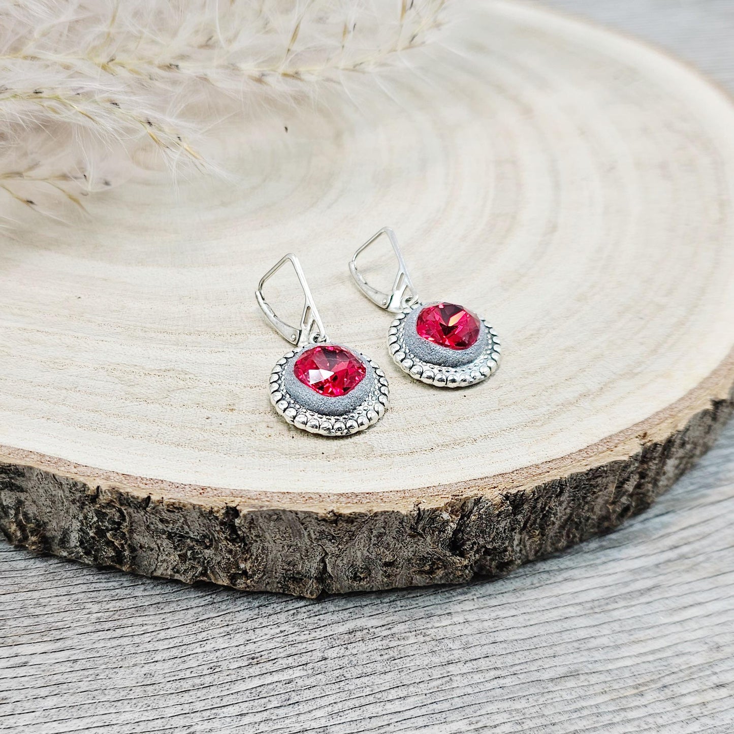 Elegant RED dangle earrings with sparkling crystals set in metal frames with polymer clay details. Silver hooks. Packaged in a paper gift box. A perfect accessory for any occasion, adding a touch of brilliance and sophistication