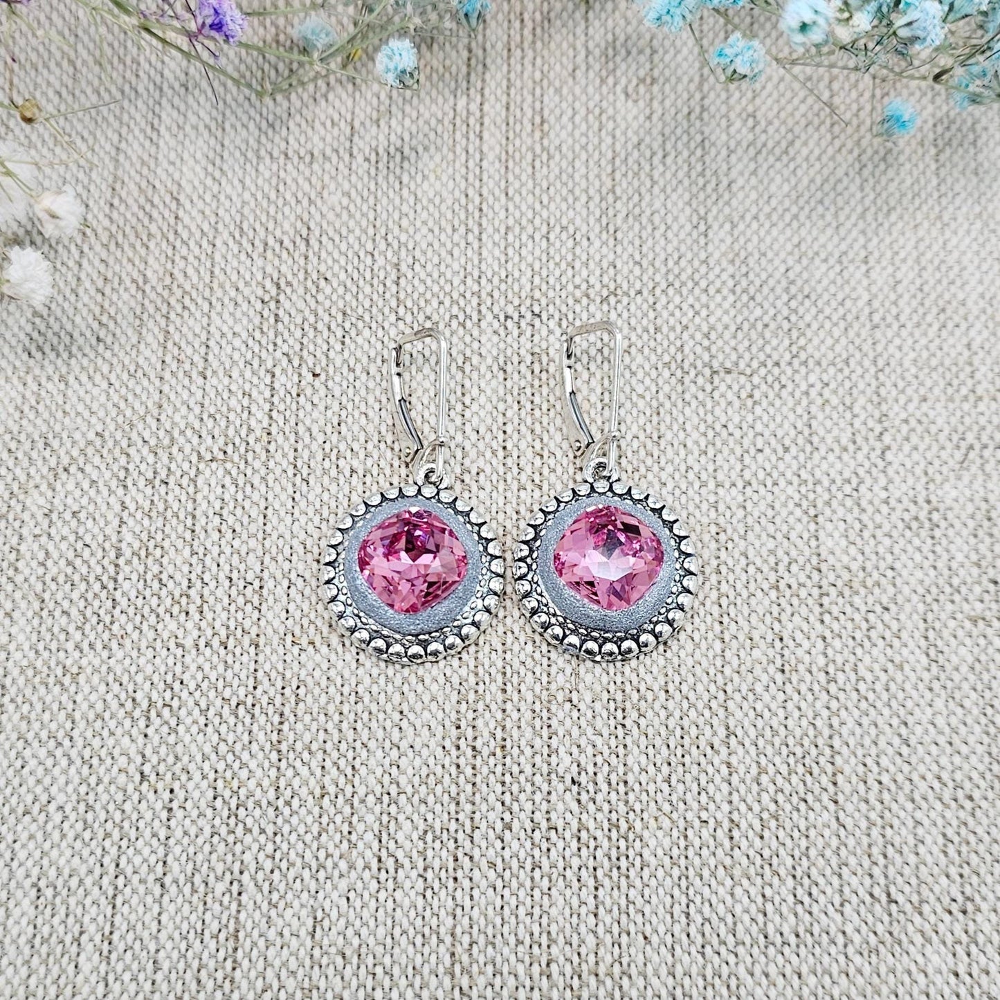 Elegant dangle earrings with sparkling rose crystals set in metal frames with polymer clay details. Silver hooks. Packaged in a paper gift box. A perfect accessory for any occasion, adding a touch of brilliance and sophistication