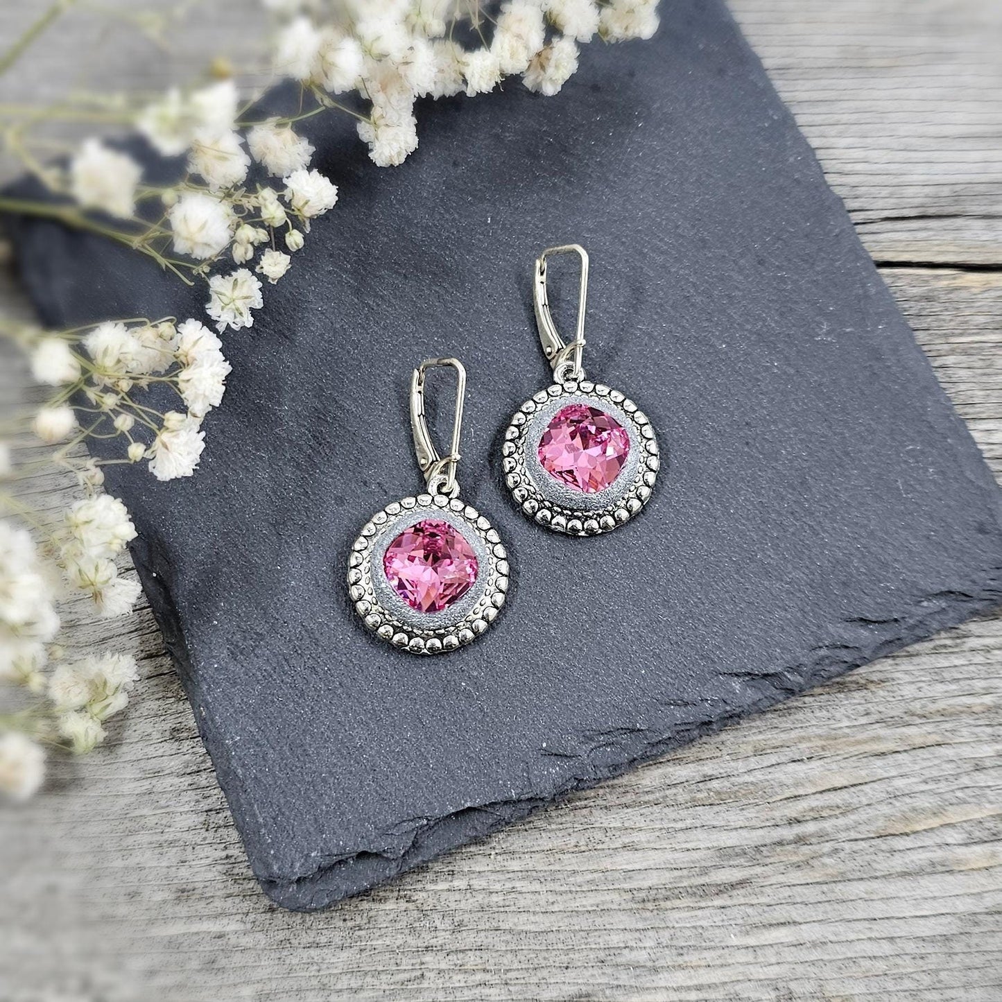 Elegant dangle earrings with sparkling rose crystals set in metal frames with polymer clay details. Silver hooks. Packaged in a paper gift box. A perfect accessory for any occasion, adding a touch of brilliance and sophistication