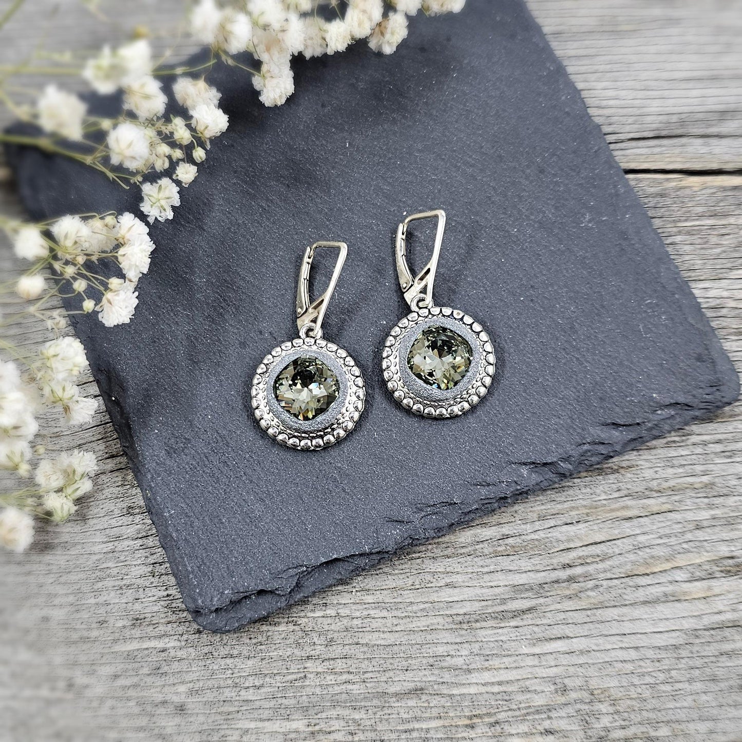 Elegant dangle earrings with sparkling Black Diamond crystals set in metal frames with polymer clay details. Silver hooks. Packaged in a paper gift box. A perfect accessory for any occasion, adding a touch of brilliance and sophistication