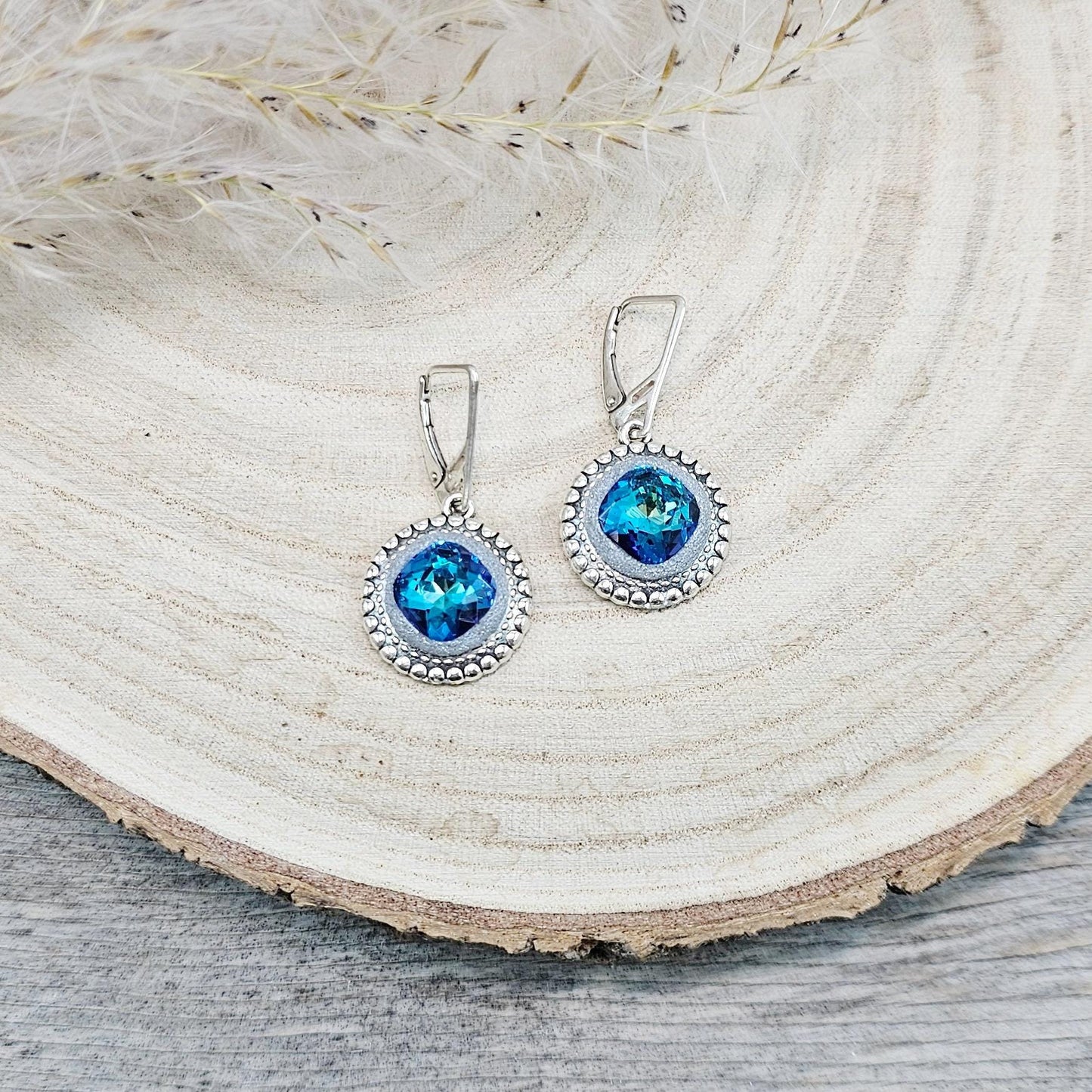 Elegant BLUE dangle earrings with sparkling blue crystals set in metal frames with polymer clay details. Silver hooks. Packaged in a paper gift box. A perfect accessory for any occasion, adding a touch of brilliance and sophistication