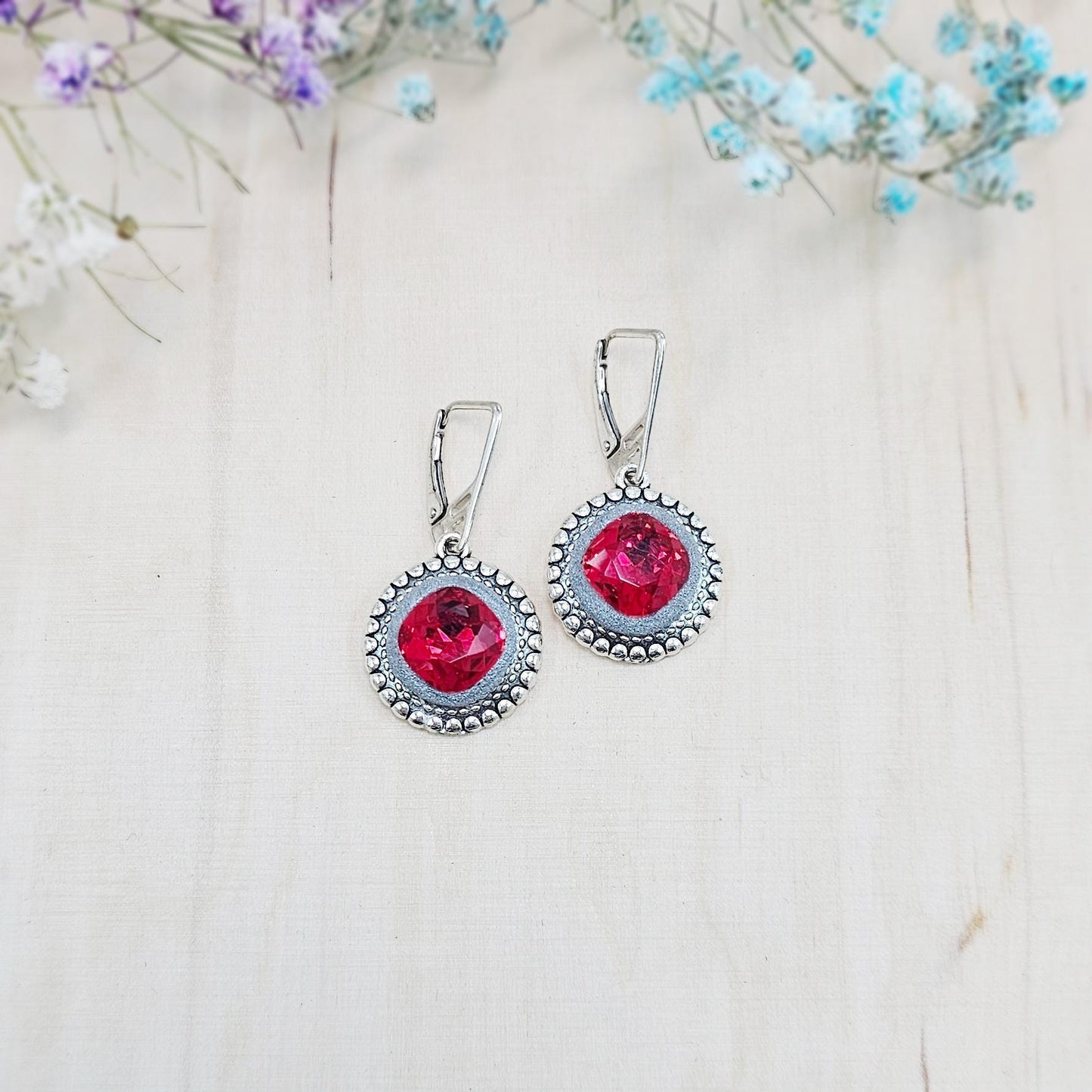 Elegant RED dangle earrings with sparkling crystals set in metal frames with polymer clay details. Silver hooks. Packaged in a paper gift box. A perfect accessory for any occasion, adding a touch of brilliance and sophistication