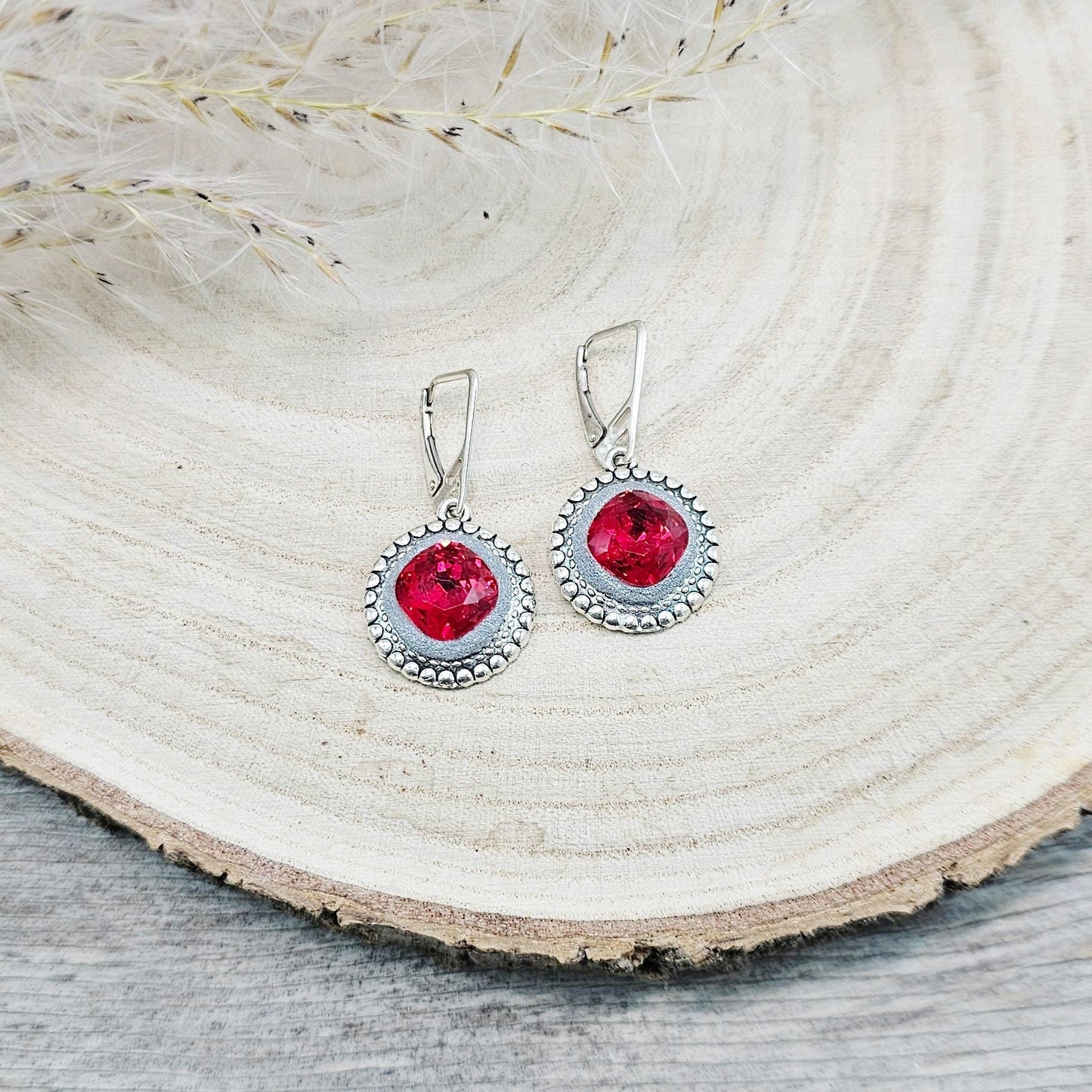 Elegant RED dangle earrings with sparkling crystals set in metal frames with polymer clay details. Silver hooks. Packaged in a paper gift box. A perfect accessory for any occasion, adding a touch of brilliance and sophistication