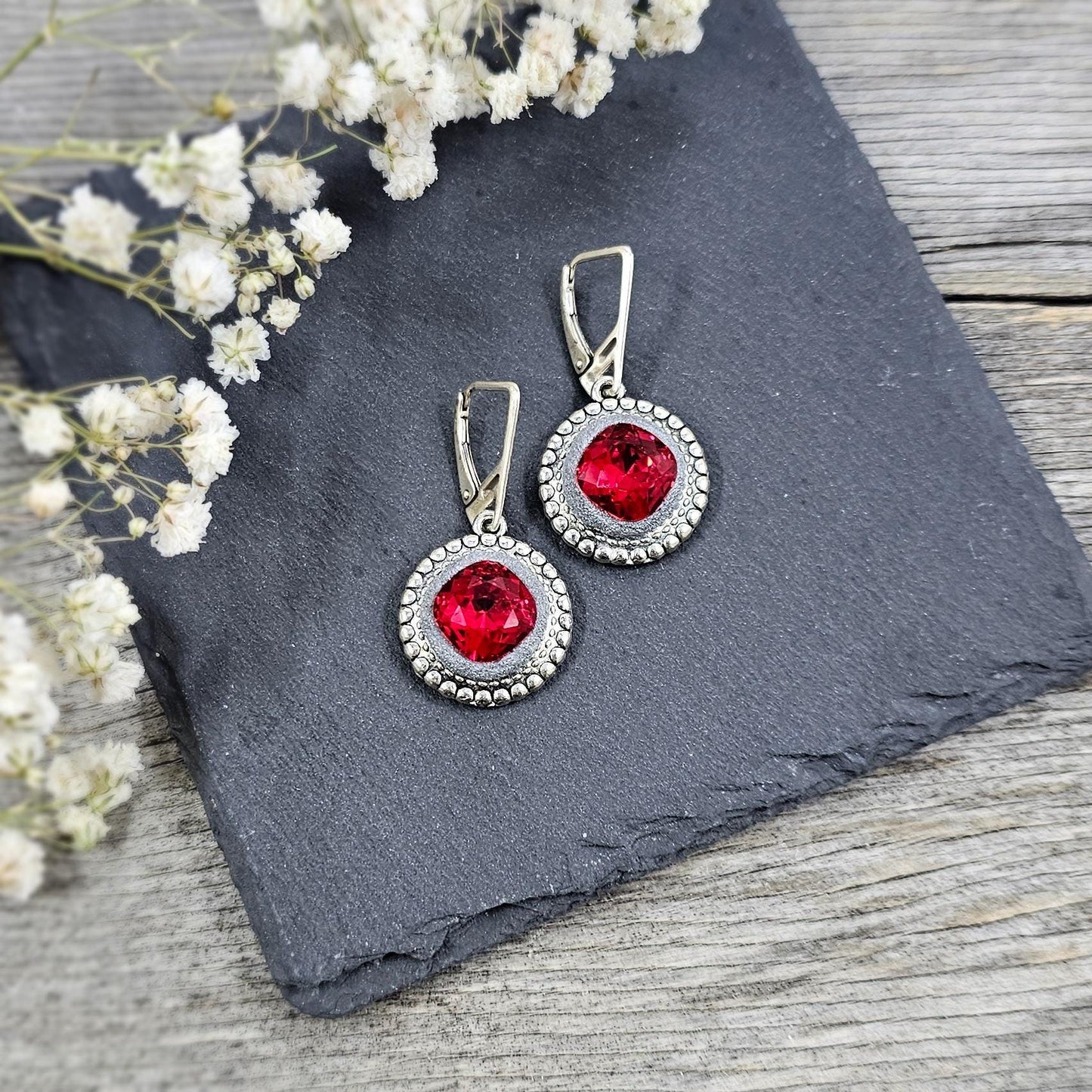 Elegant RED dangle earrings with sparkling crystals set in metal frames with polymer clay details. Silver hooks. Packaged in a paper gift box. A perfect accessory for any occasion, adding a touch of brilliance and sophistication