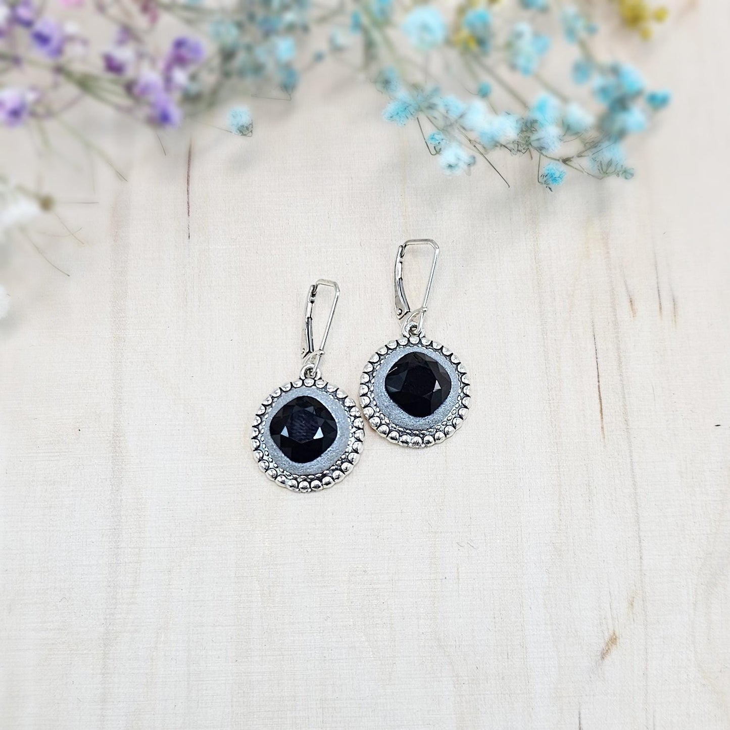 Elegant dangle earrings with sparkling black crystals set in metal frames with polymer clay details. Silver hooks. Packaged in a paper gift box. A perfect accessory for any occasion, adding a touch of brilliance and sophistication