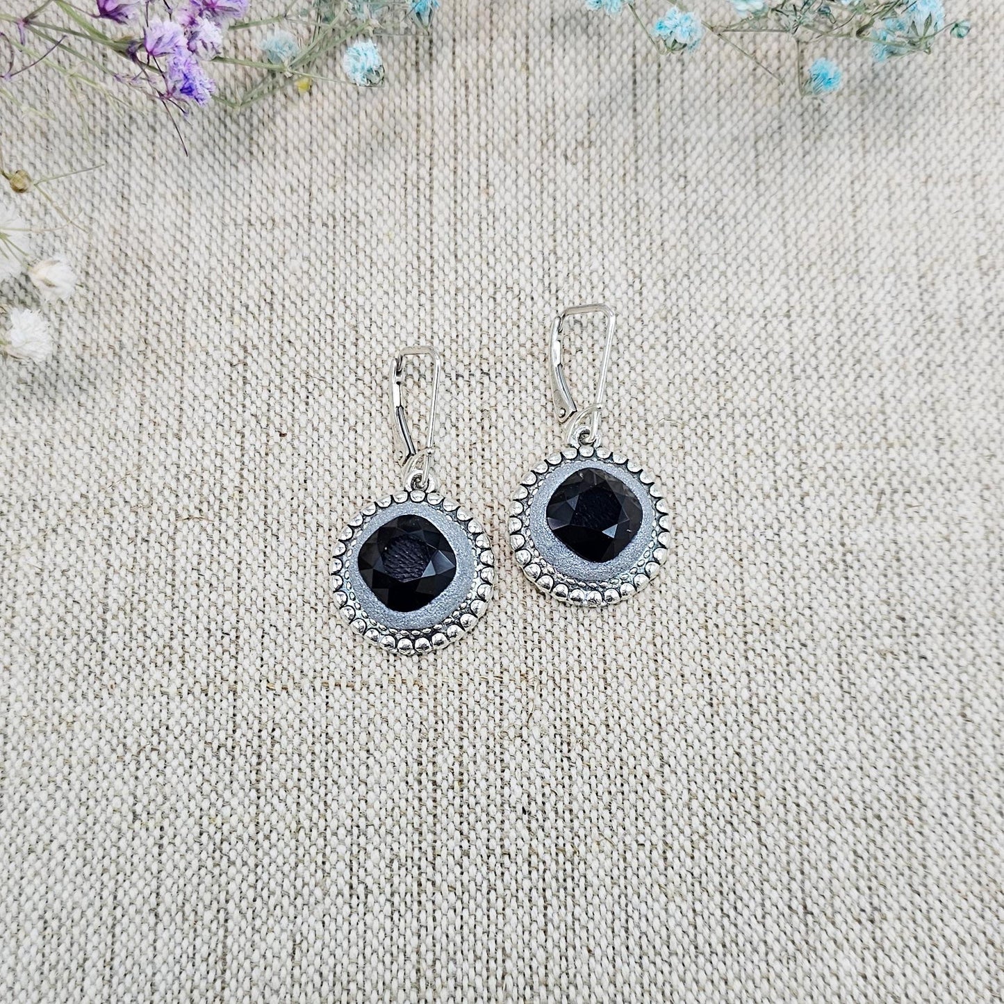 Elegant dangle earrings with sparkling black crystals set in metal frames with polymer clay details. Silver hooks. Packaged in a paper gift box. A perfect accessory for any occasion, adding a touch of brilliance and sophistication