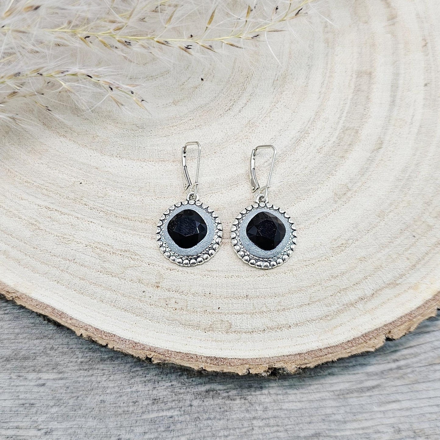 Elegant dangle earrings with sparkling black crystals set in metal frames with polymer clay details. Silver hooks. Packaged in a paper gift box. A perfect accessory for any occasion, adding a touch of brilliance and sophistication