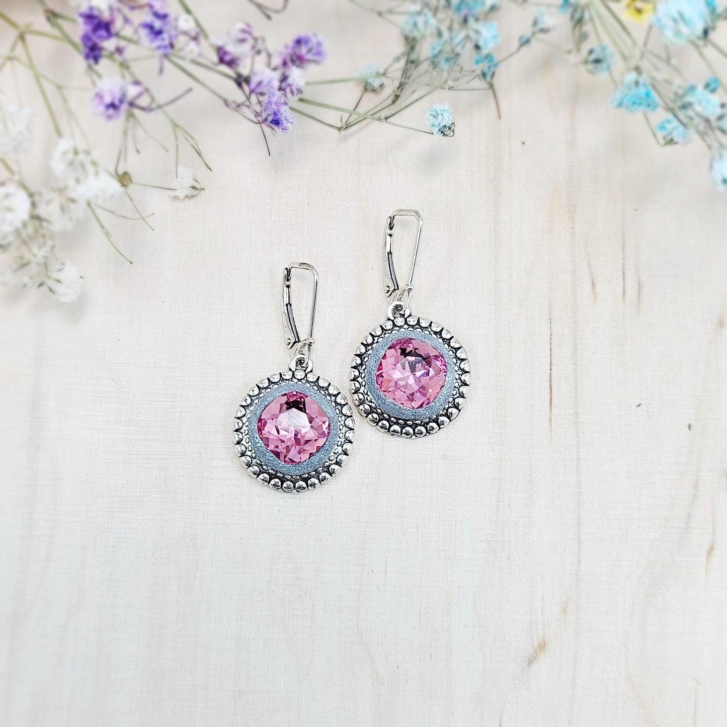 Elegant dangle earrings with sparkling rose crystals set in metal frames with polymer clay details. Silver hooks. Packaged in a paper gift box. A perfect accessory for any occasion, adding a touch of brilliance and sophistication