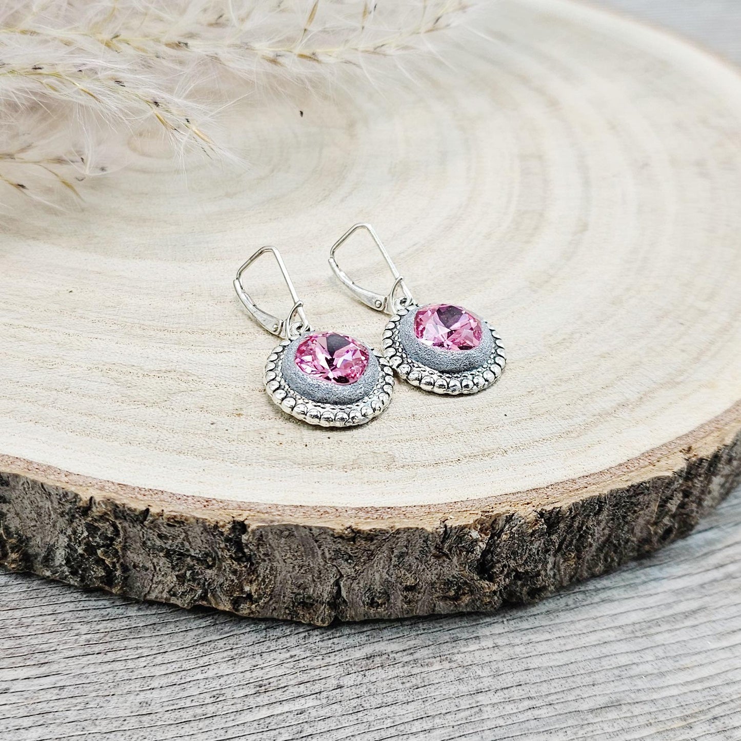 Elegant dangle earrings with sparkling rose crystals set in metal frames with polymer clay details. Silver hooks. Packaged in a paper gift box. A perfect accessory for any occasion, adding a touch of brilliance and sophistication