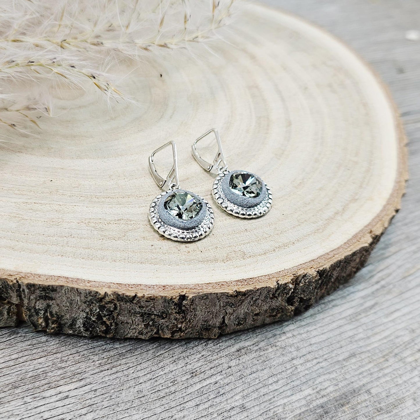 Elegant dangle earrings with sparkling Black Diamond crystals set in metal frames with polymer clay details. Silver hooks. Packaged in a paper gift box. A perfect accessory for any occasion, adding a touch of brilliance and sophistication
