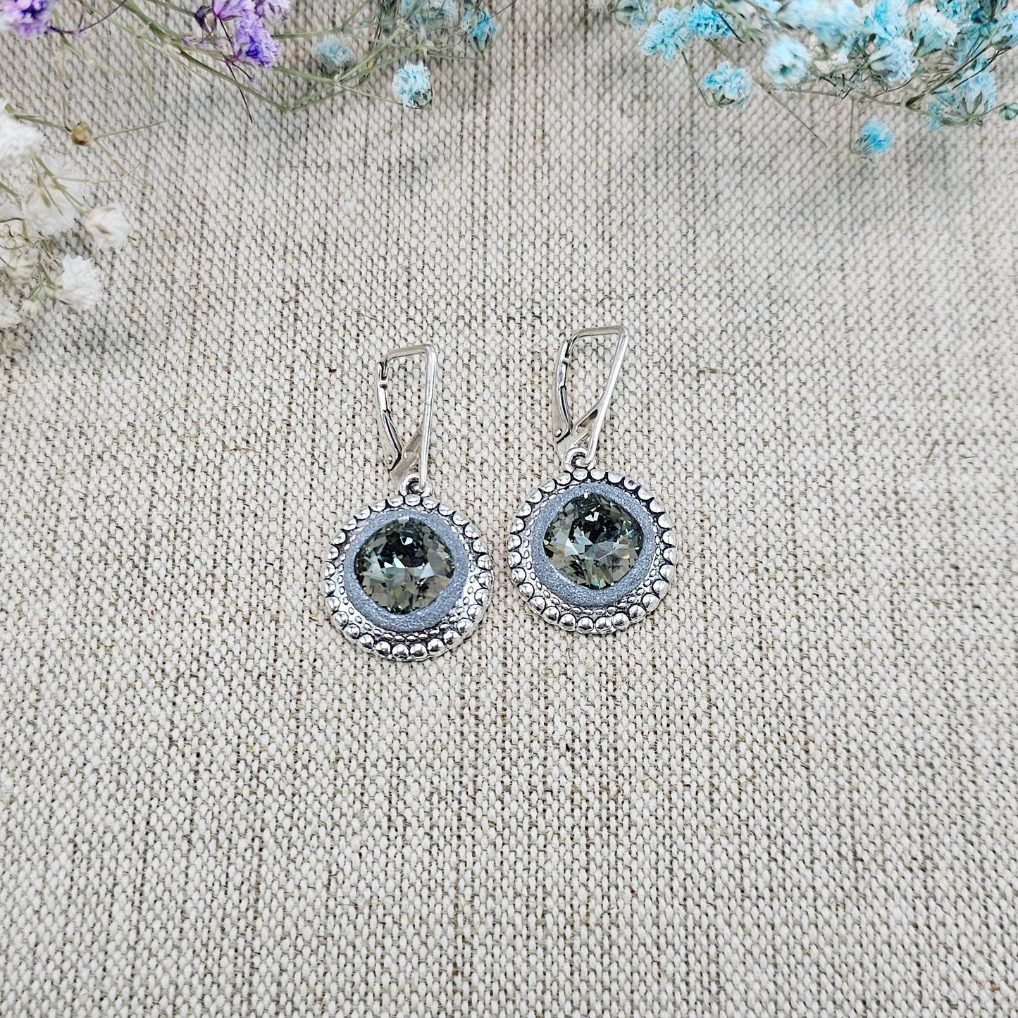 Elegant dangle earrings with sparkling Black Diamond crystals set in metal frames with polymer clay details. Silver hooks. Packaged in a paper gift box. A perfect accessory for any occasion, adding a touch of brilliance and sophistication