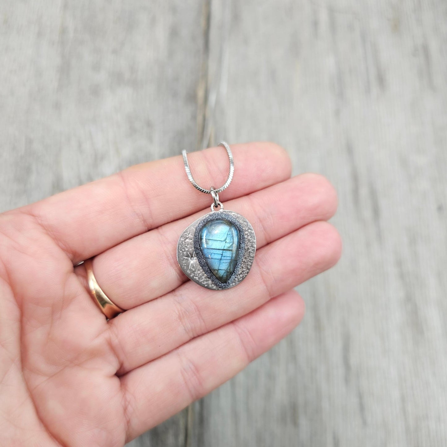 Handmade labradorite pendant necklace with a short stainless steel chain. Features a unique polymer clay setting. One of a kind magical jewelry, perfect gift for her.