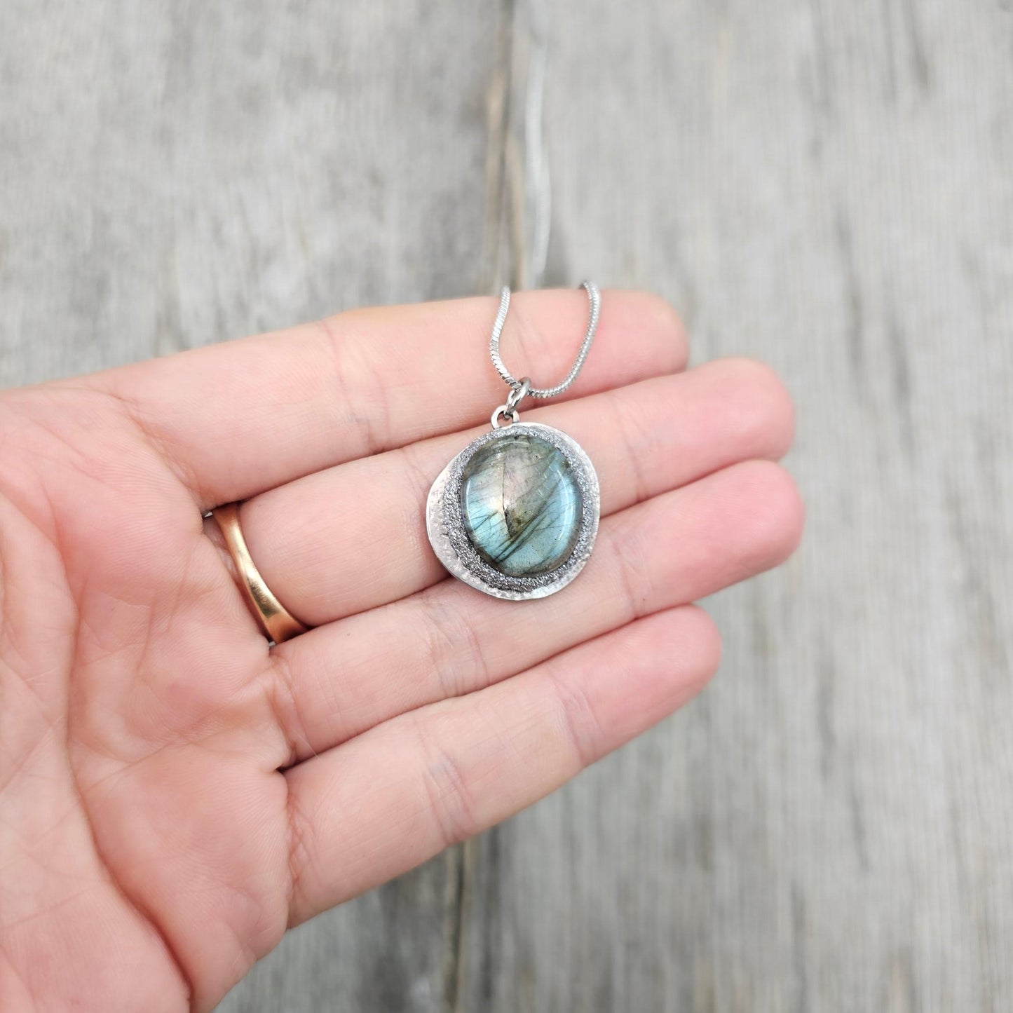 Handmade labradorite pendant necklace with a short stainless steel chain. Features a unique polymer clay setting. One of a kind magical jewelry, perfect gift for her.