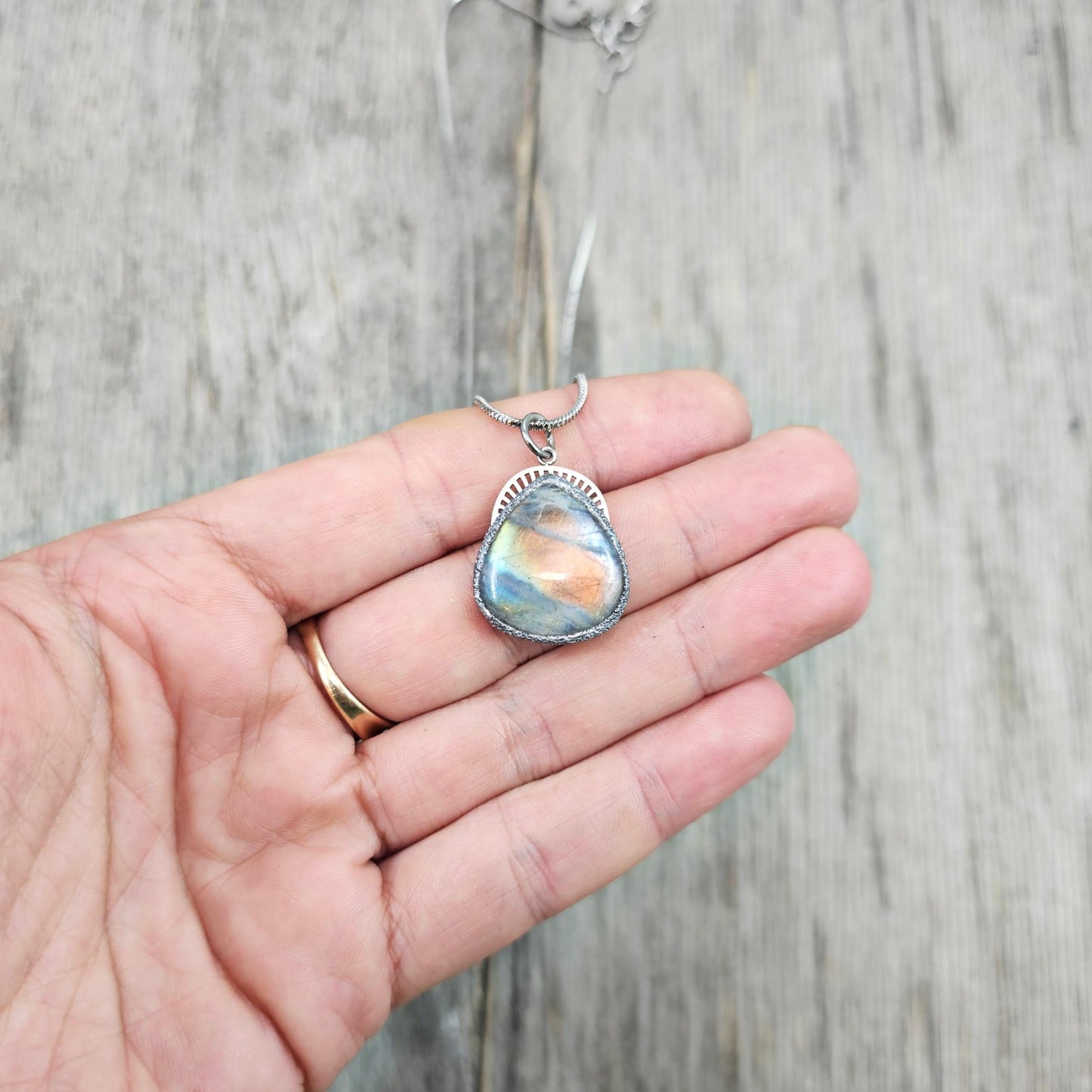 Handmade labradorite pendant necklace with a short stainless steel chain. Features a unique polymer clay setting. One of a kind magical jewelry, perfect gift for her.