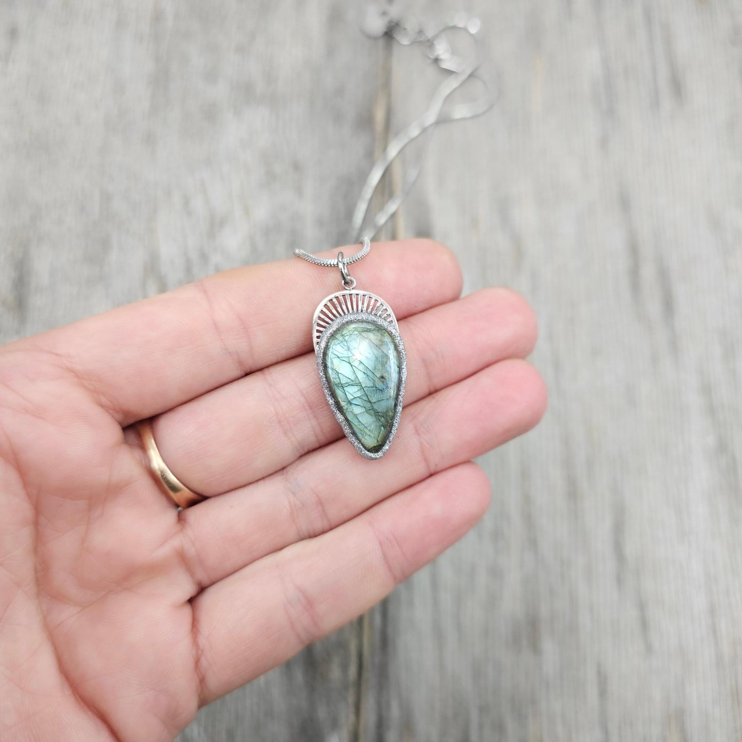 Handmade labradorite pendant necklace with a short stainless steel chain. Features a unique polymer clay setting. One of a kind magical jewelry, perfect gift for her.
