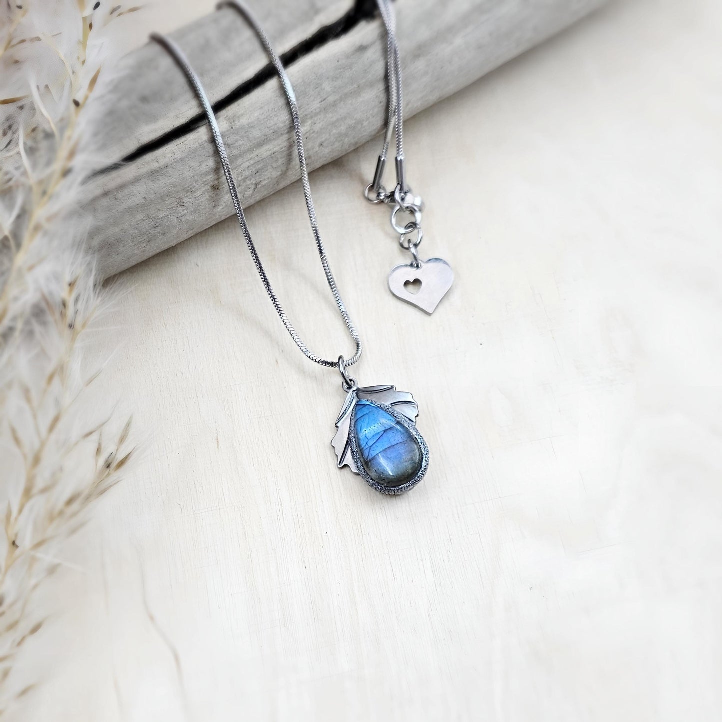 Handmade labradorite pendant necklace with a short stainless steel chain. Features a unique polymer clay setting. One of a kind magical jewelry, perfect gift for her.