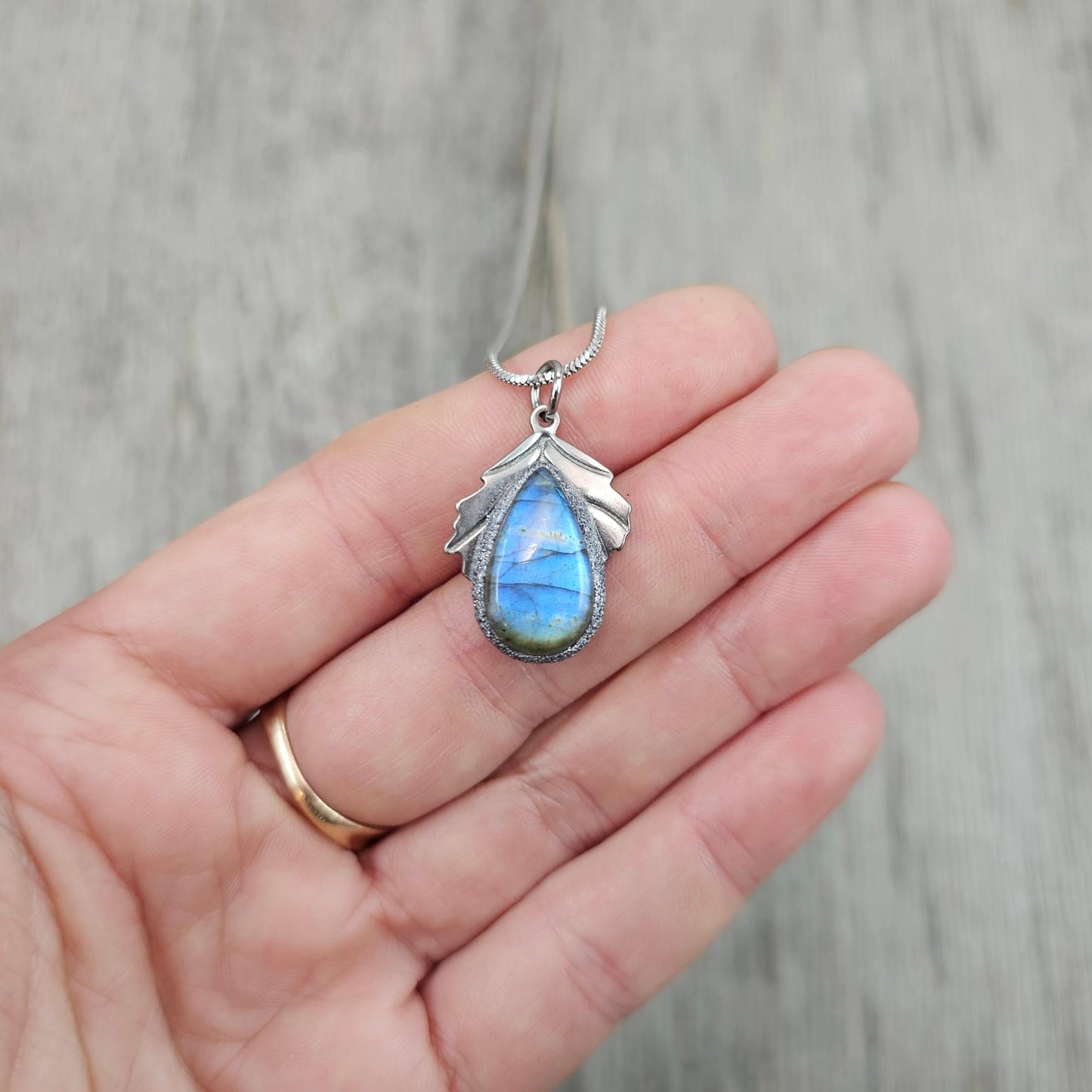 Handmade labradorite pendant necklace with a short stainless steel chain. Features a unique polymer clay setting. One of a kind magical jewelry, perfect gift for her.