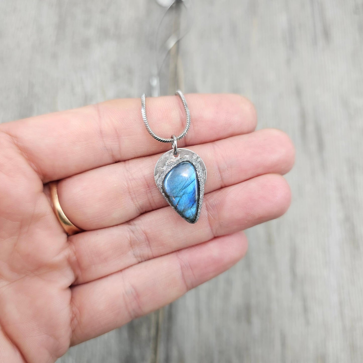 Handmade labradorite pendant necklace with a short stainless steel chain. Features a unique polymer clay setting. One of a kind magical jewelry, perfect gift for her.