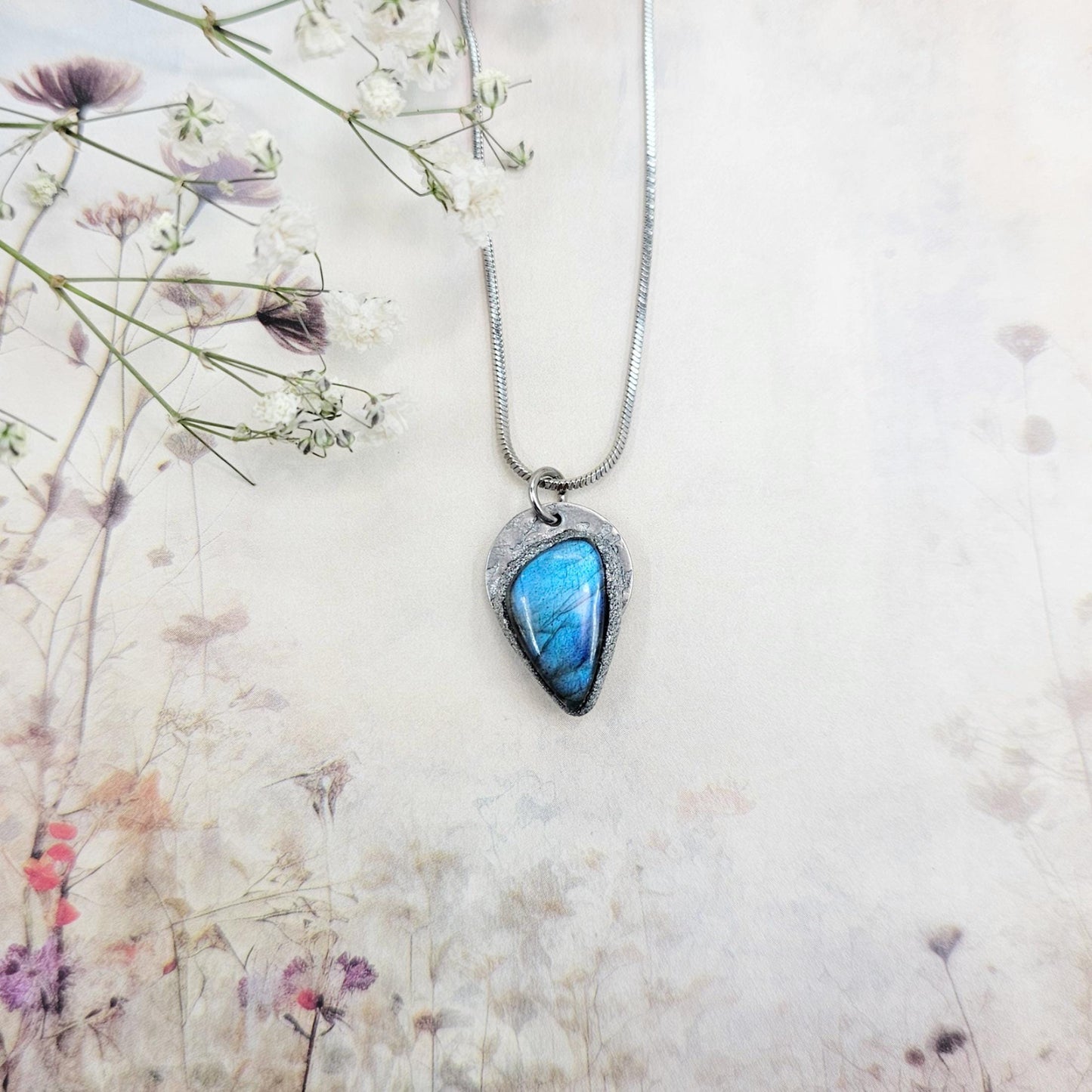Handmade labradorite pendant necklace with a short stainless steel chain. Features a unique polymer clay setting. One of a kind magical jewelry, perfect gift for her.