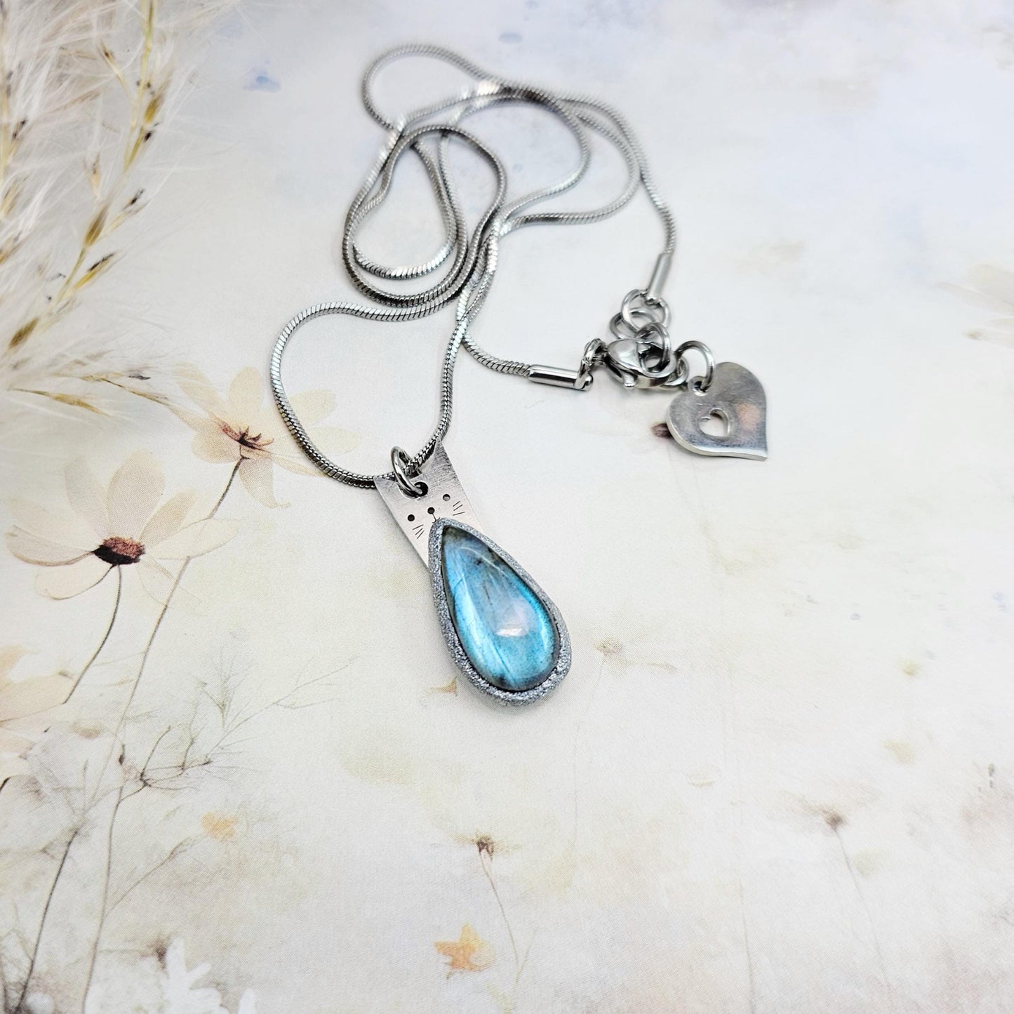 Handmade labradorite pendant necklace with a short stainless steel chain. Features a unique polymer clay setting. One of a kind magical jewelry, perfect gift for her.