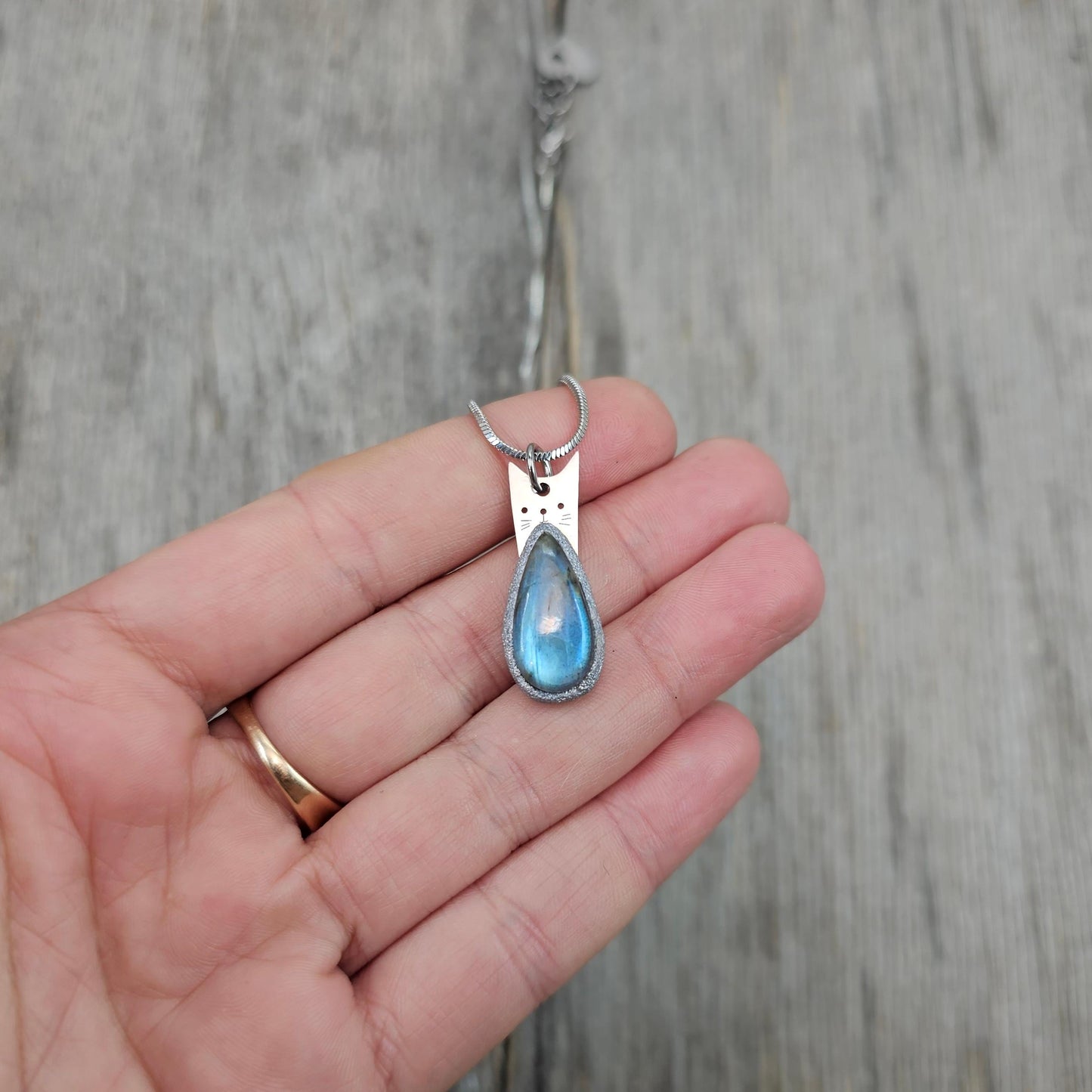 Handmade labradorite pendant necklace with a short stainless steel chain. Features a unique polymer clay setting. One of a kind magical jewelry, perfect gift for her.