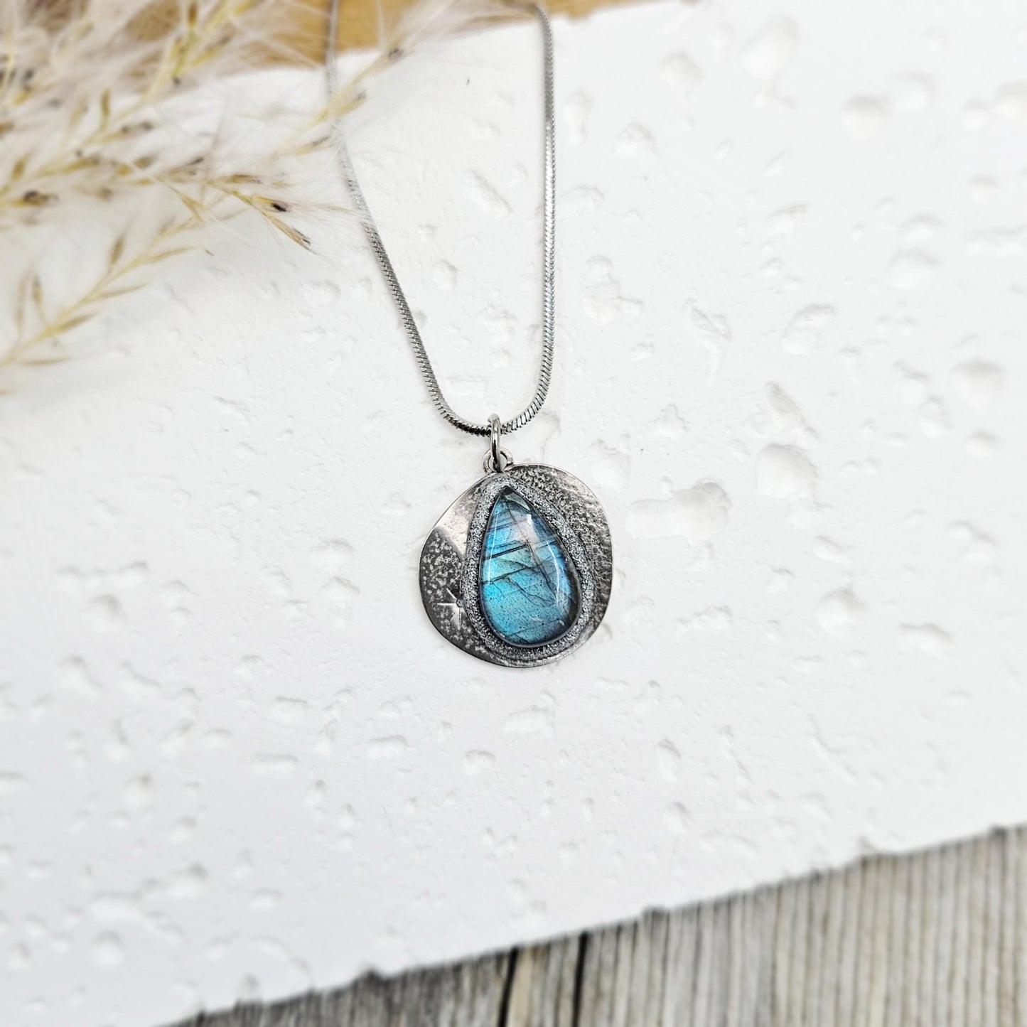 Handmade labradorite pendant necklace with a short stainless steel chain. Features a unique polymer clay setting. One of a kind magical jewelry, perfect gift for her.