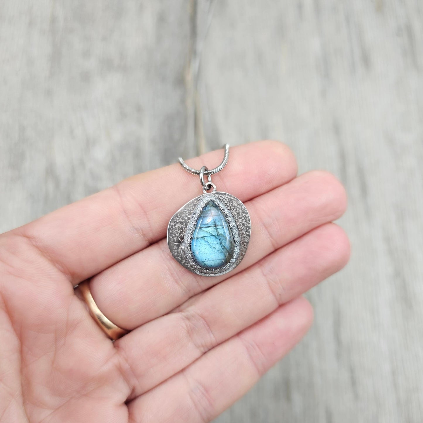 Handmade labradorite pendant necklace with a short stainless steel chain. Features a unique polymer clay setting. One of a kind magical jewelry, perfect gift for her.