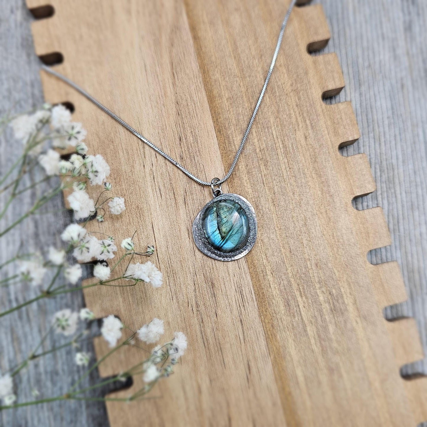 Handmade labradorite pendant necklace with a short stainless steel chain. Features a unique polymer clay setting. One of a kind magical jewelry, perfect gift for her.