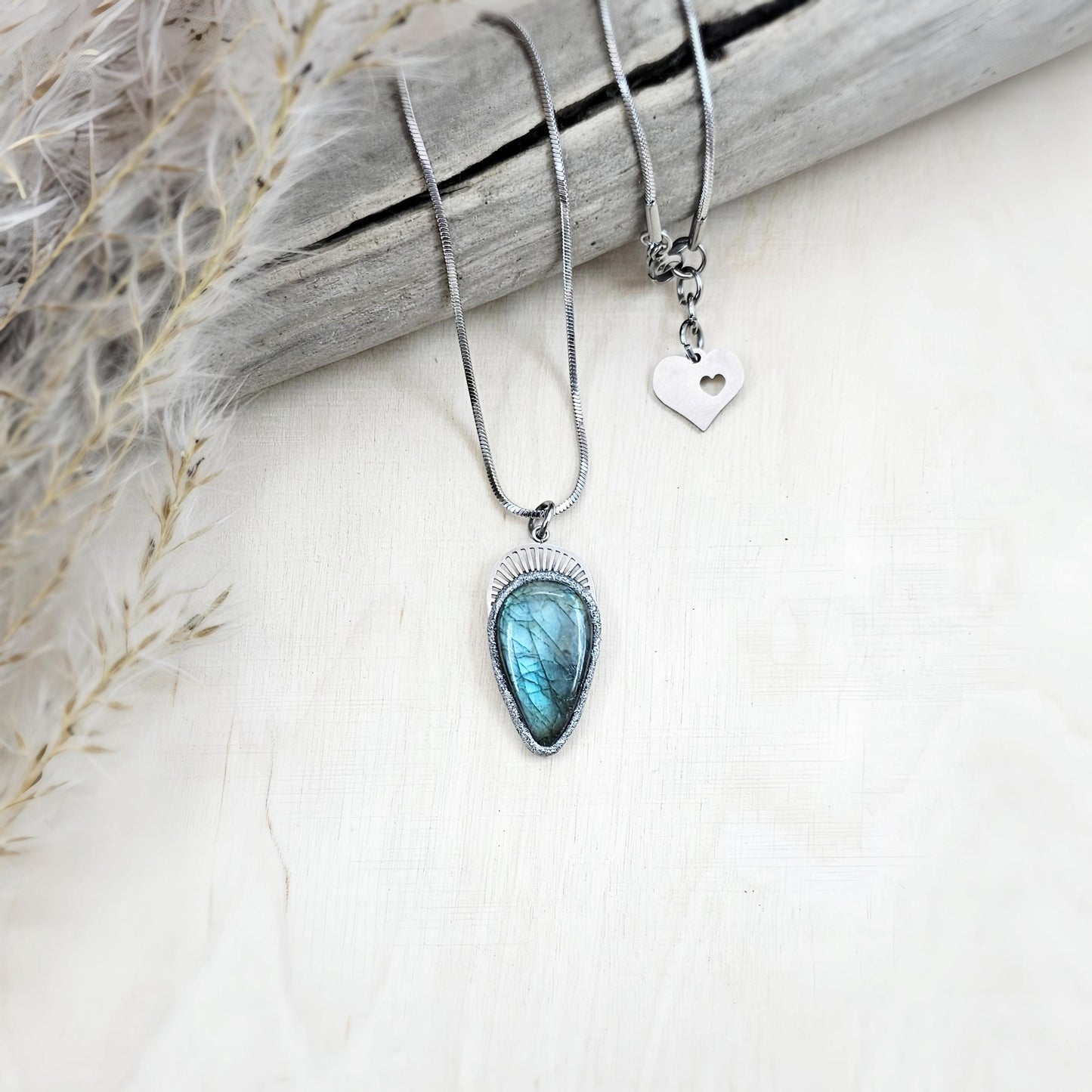 Handmade labradorite pendant necklace with a short stainless steel chain. Features a unique polymer clay setting. One of a kind magical jewelry, perfect gift for her.