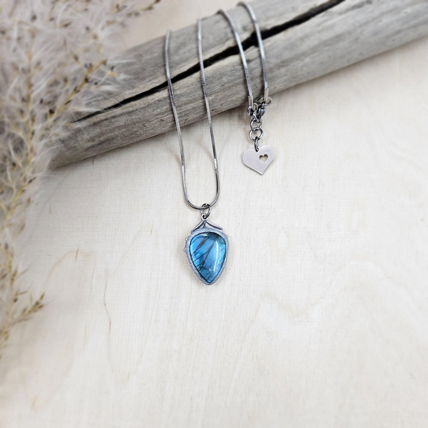 Handmade labradorite pendant necklace with a short stainless steel chain. Features a unique polymer clay setting. One of a kind magical jewelry, perfect gift for her.