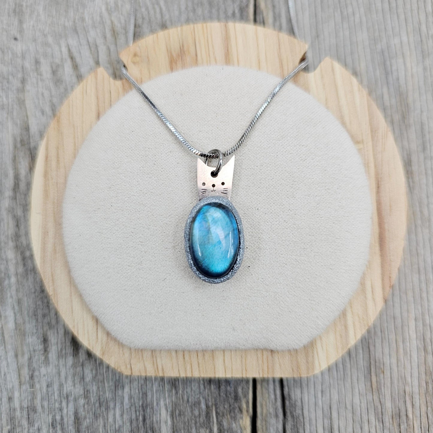 Handmade labradorite pendant necklace with a short stainless steel chain. Features a unique polymer clay setting. One of a kind magical jewelry, perfect gift for her.