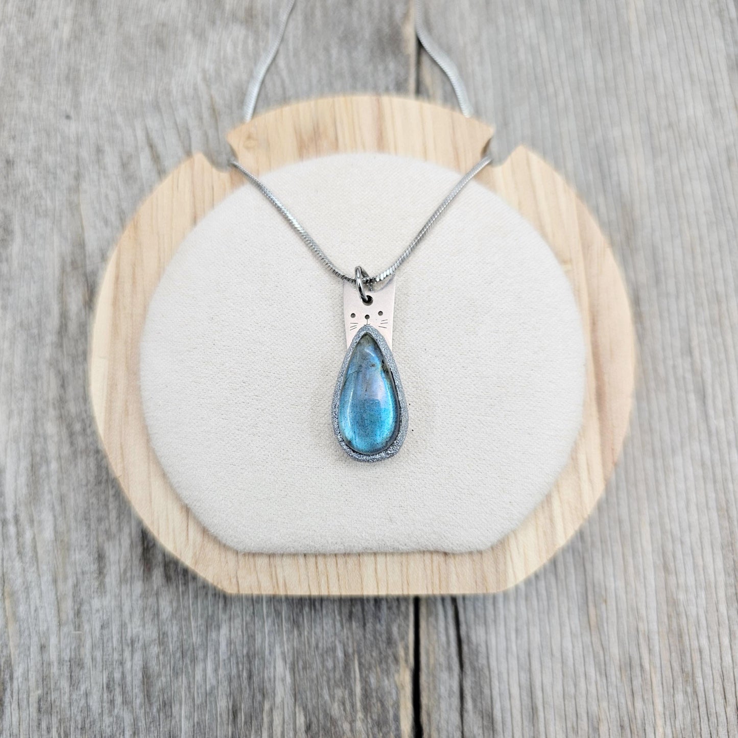 Handmade labradorite pendant necklace with a short stainless steel chain. Features a unique polymer clay setting. One of a kind magical jewelry, perfect gift for her.