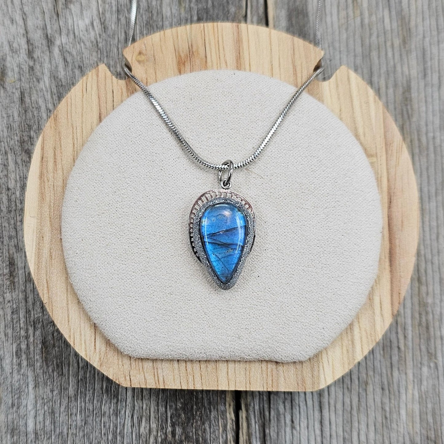 Handmade labradorite pendant necklace with a short stainless steel chain. Features a unique polymer clay setting. One of a kind magical jewelry, perfect gift for her.