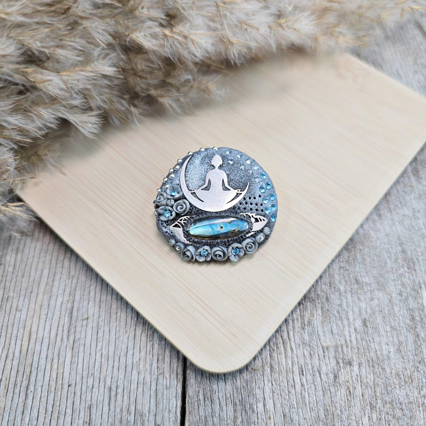 Handmade brooch with labradorite and yoga goddess design, crafted from polymer clay and stainless steel – mystical and spiritual jewelry.