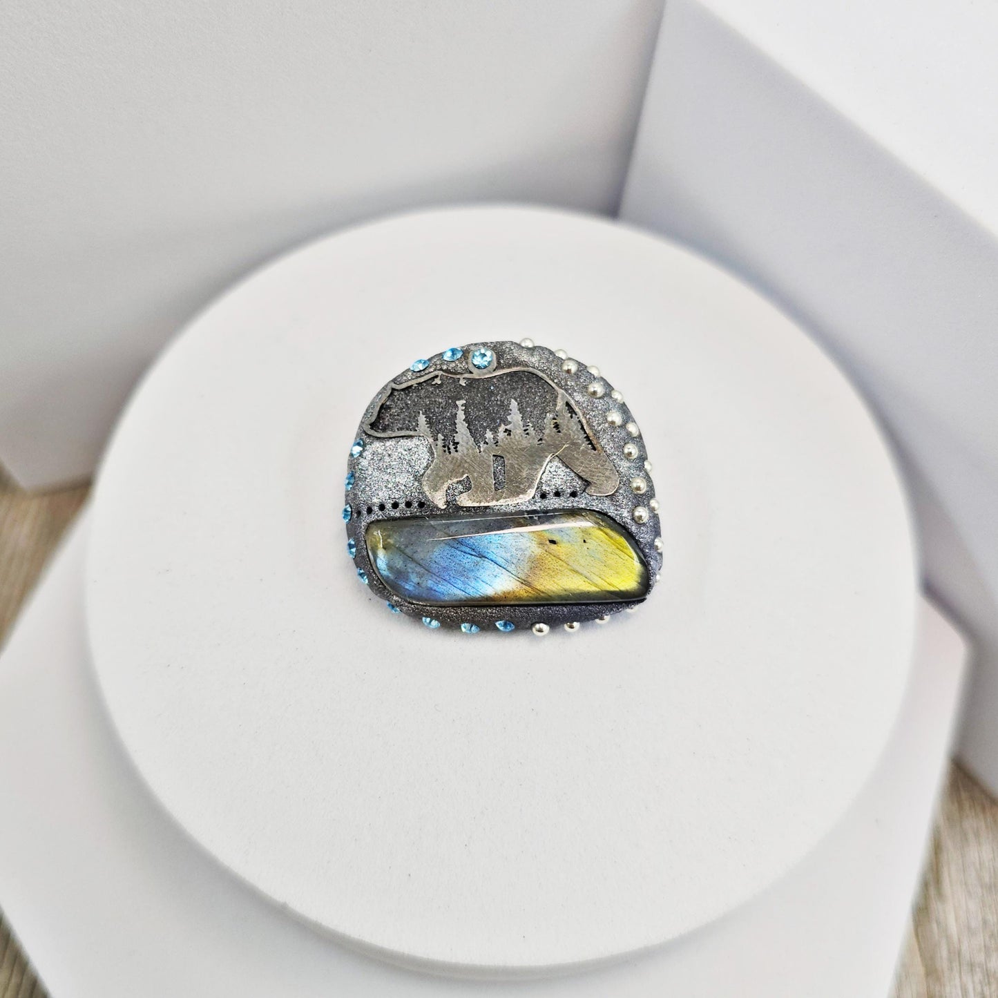 Handmade brooch with labradorite and bear design – polymer clay pin symbolizing strength and protection, unique nature-inspired jewelry.