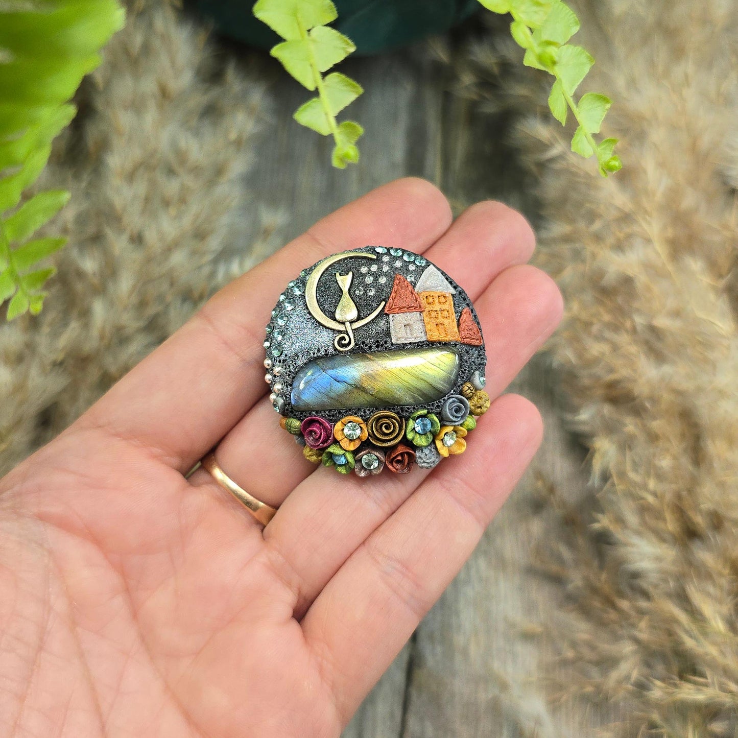 Handmade polymer clay brooch with labradorite and metal cat – magical, nature-inspired accessory for cat lovers.