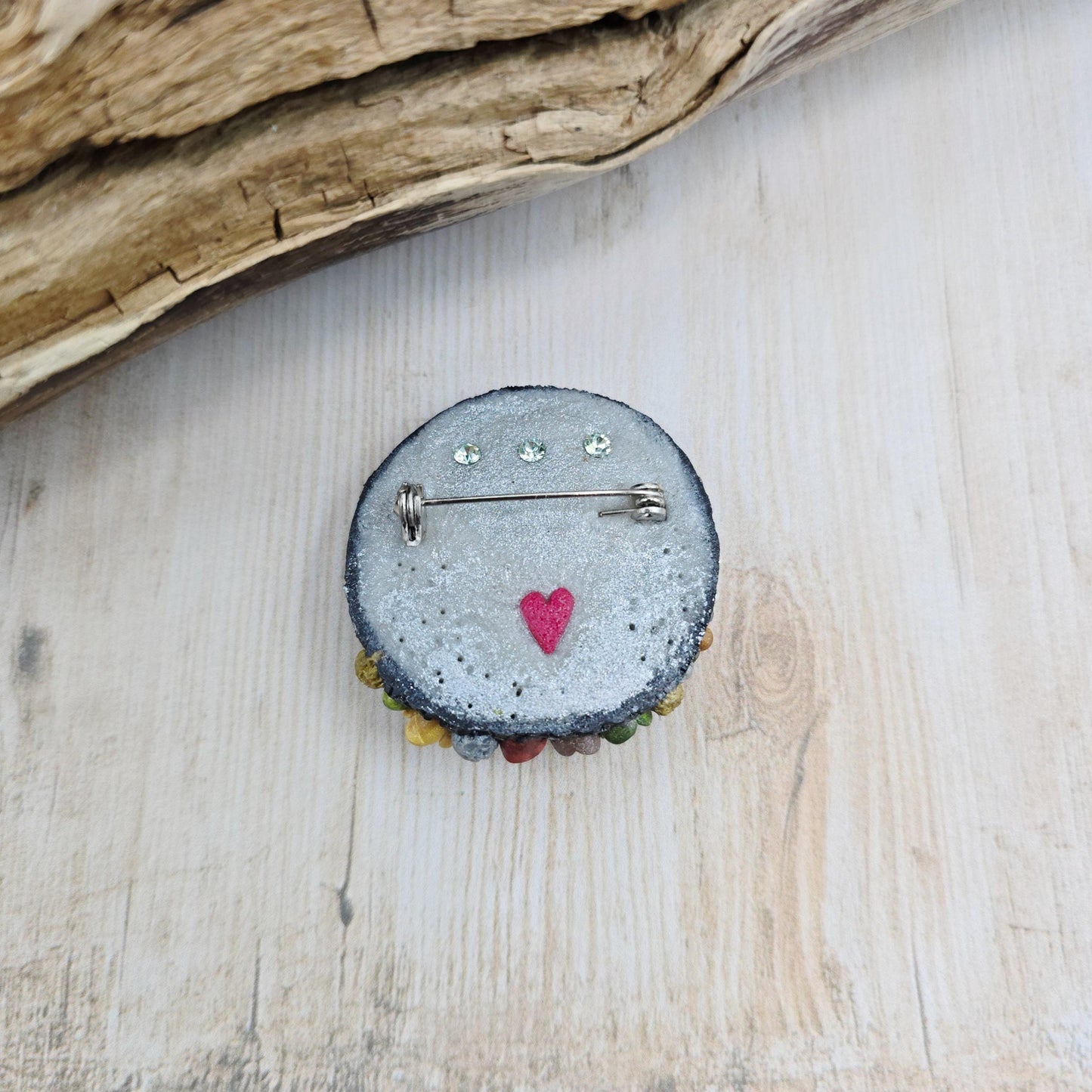 Handmade polymer clay brooch with labradorite and metal cat – magical, nature-inspired accessory for cat lovers.