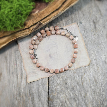 Komplektas iš saulės akmens